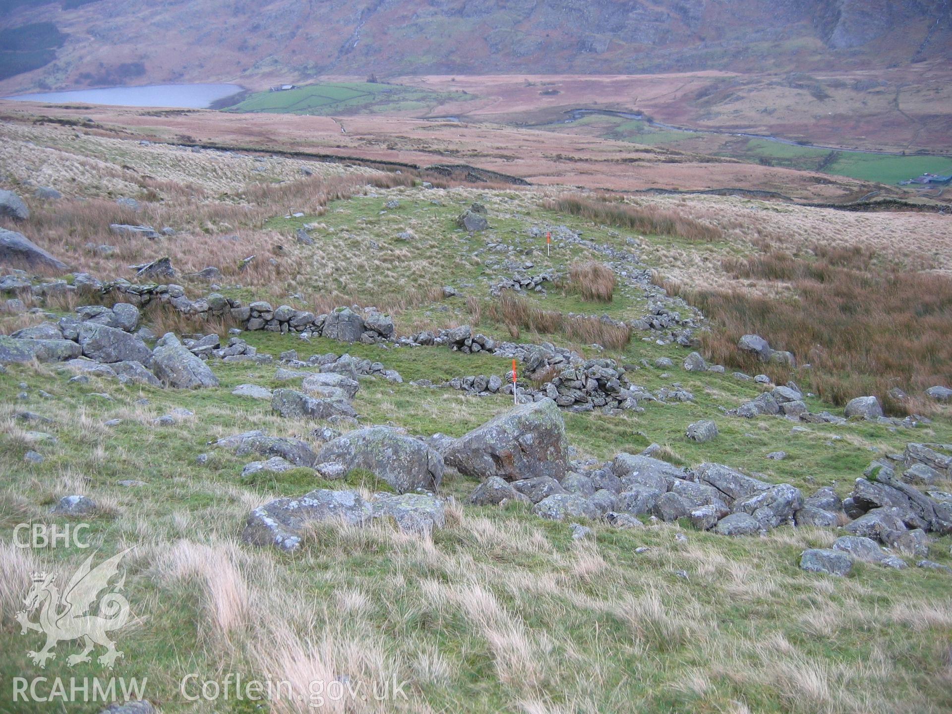 Photograph of Dyffryn Mymbyr Hut Circle Settlement II taken during Upland Survey by staff of EAS Contracts.