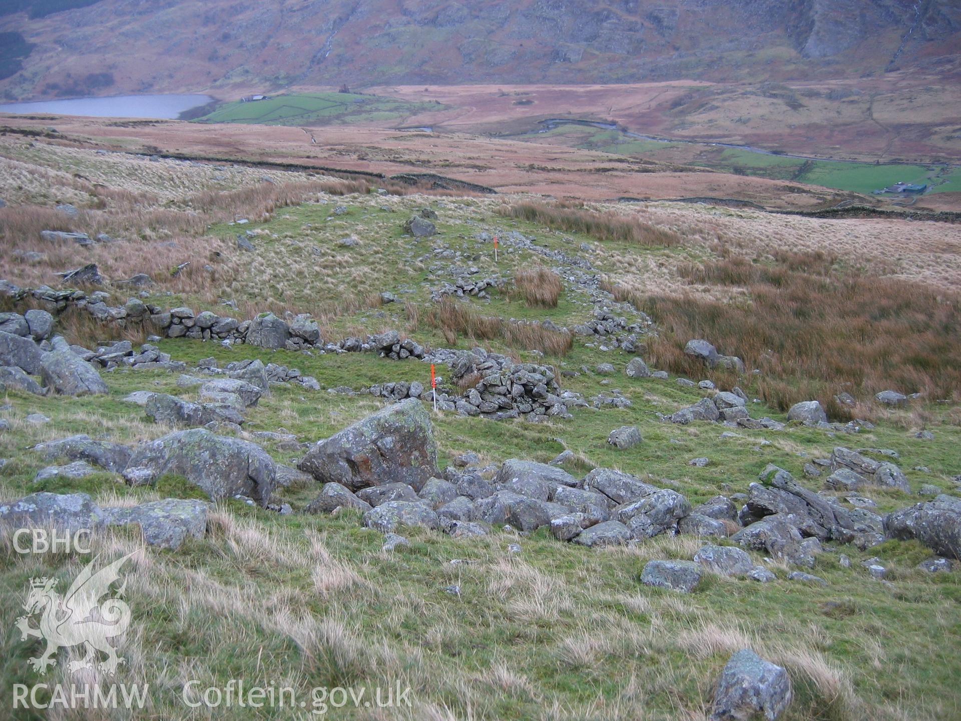 Photograph of Dyffryn Mymbyr Hut Circle Settlement II taken during Upland Survey by staff of EAS Contracts.