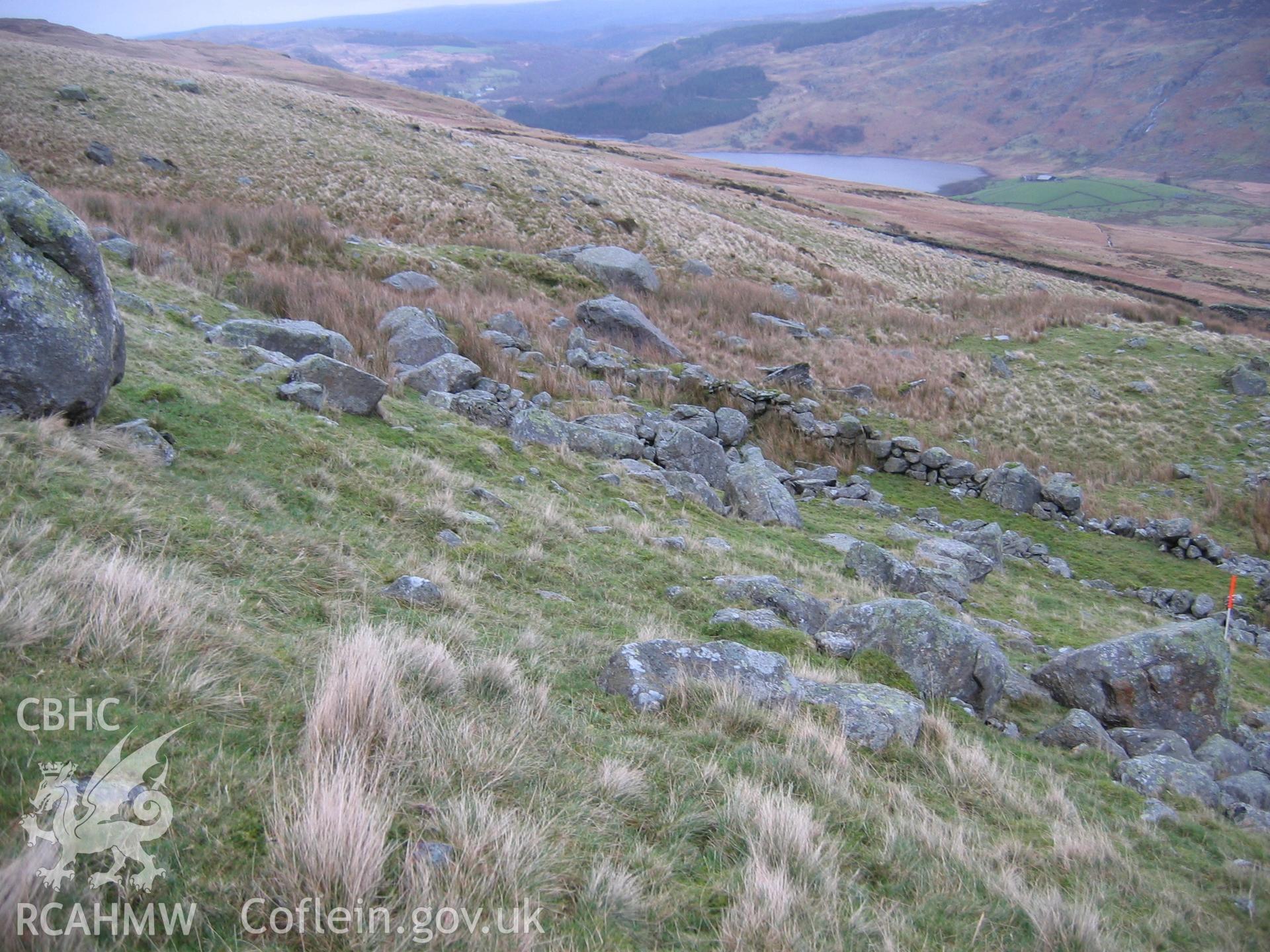 Photograph of Dyffryn Mymbyr Hut Circle Settlement II taken during Upland Survey by staff of EAS Contracts.