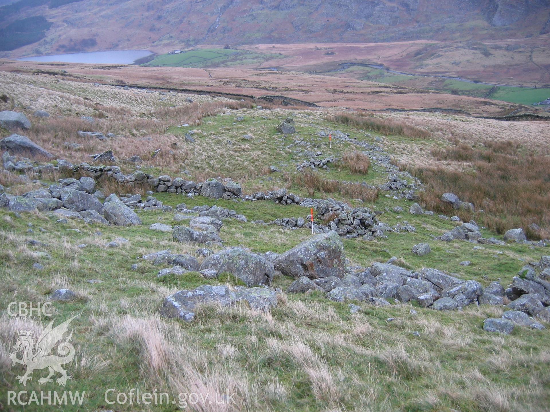 Photograph of Dyffryn Mymbyr Hut Circle Settlement II taken during Upland Survey by staff of EAS Contracts.