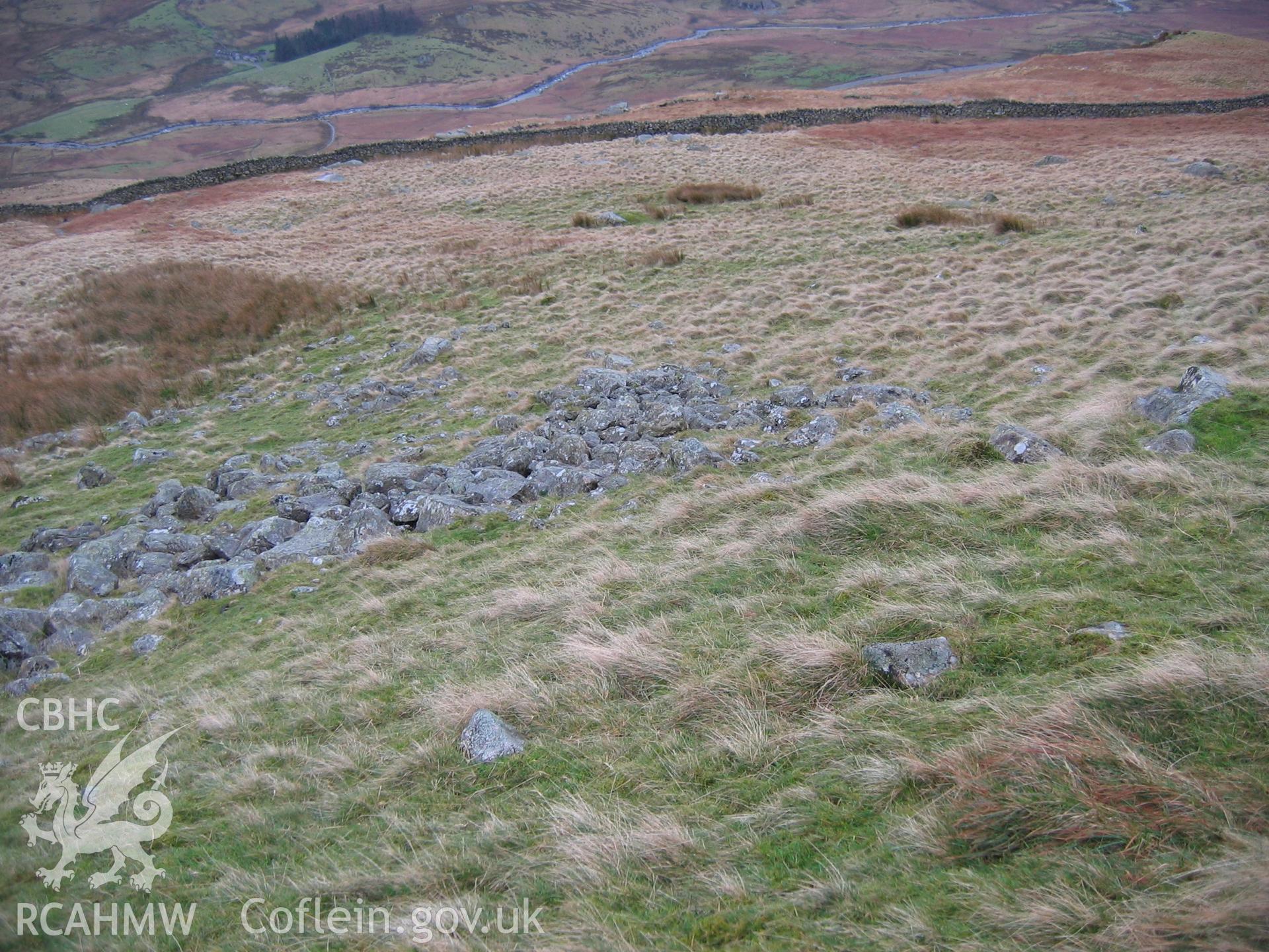 Photograph of Dyffryn Mymbyr Hut Circle Settlement II taken during Upland Survey by staff of EAS Contracts.