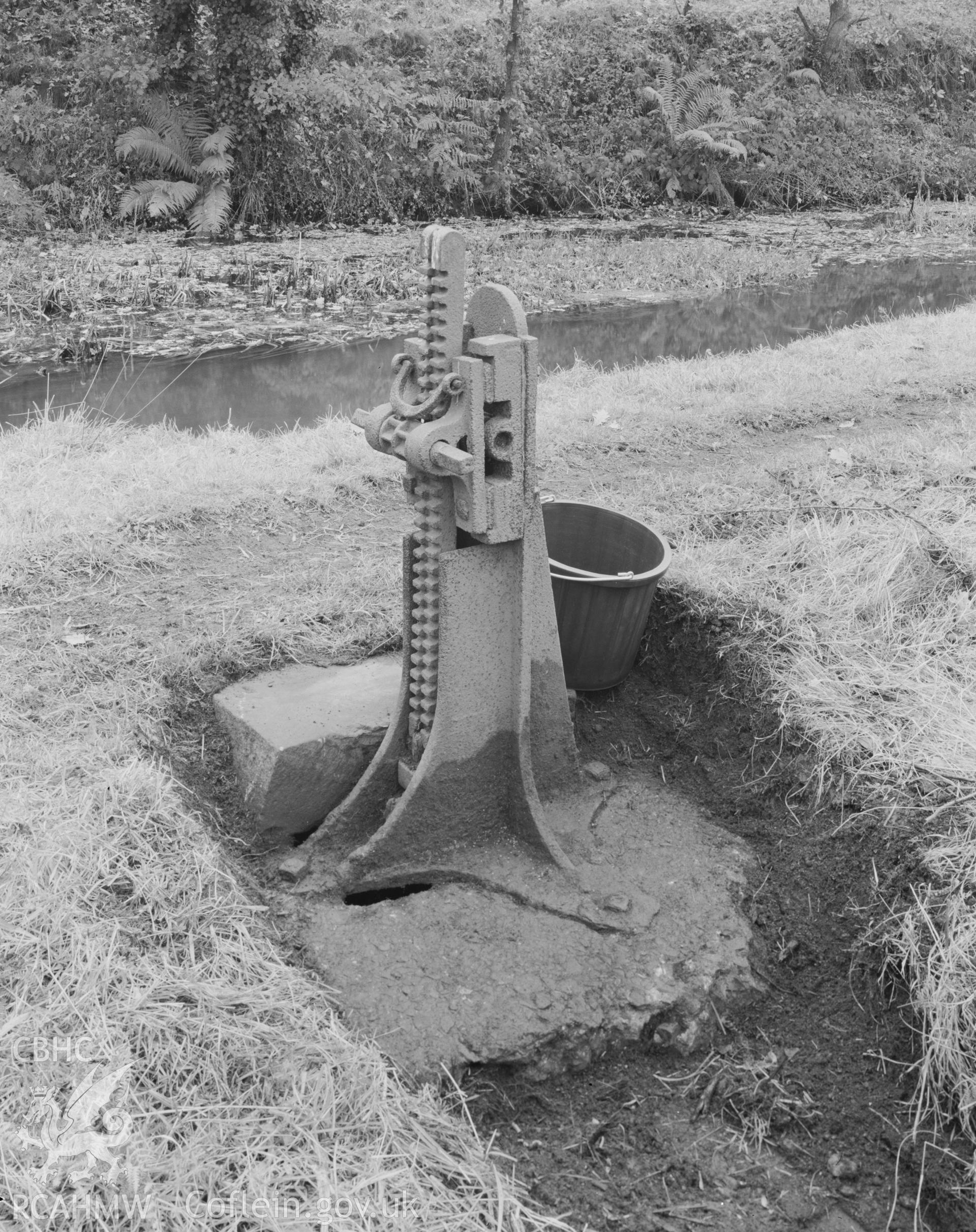 Black and white acetate negative showing view of Ynysmeudwy Bridge and paddle gear.