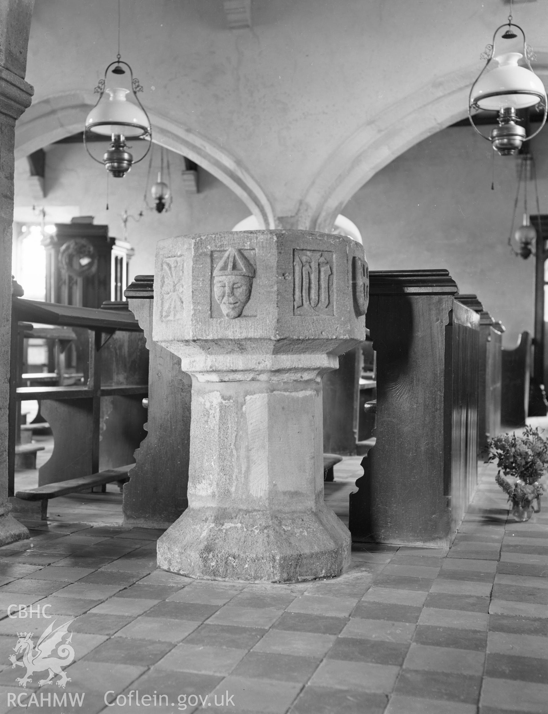 Black and white nitrate negative showing the font at Llangwnadl Church.