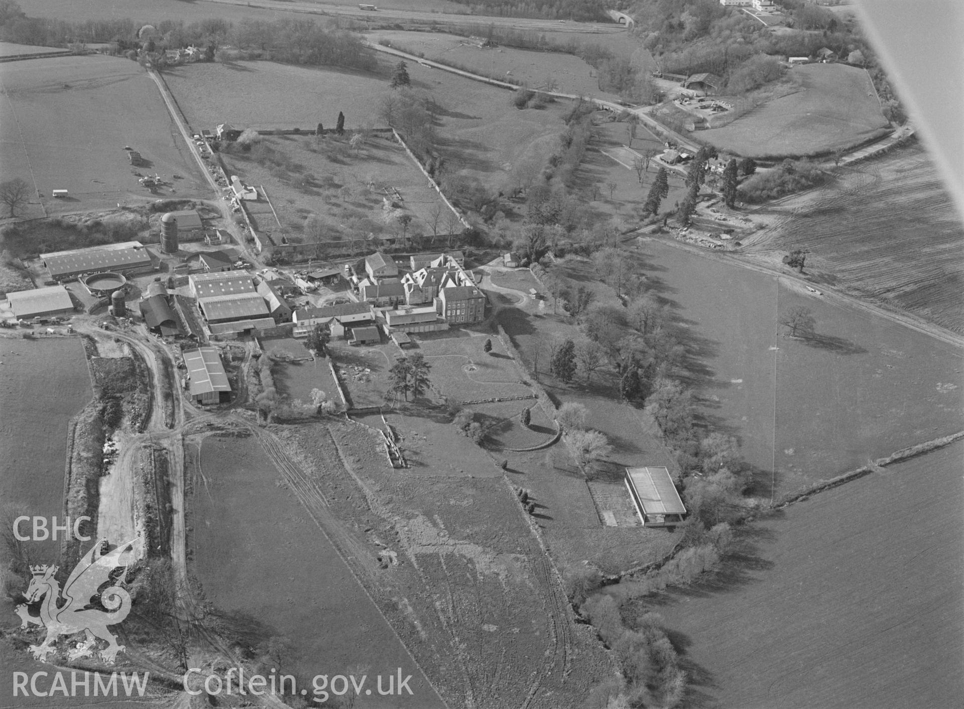 RCAHMW Black and white oblique aerial photograph of Troy House Garden, Mitchel Troy, taken by C.R. Musson, 24/03/94