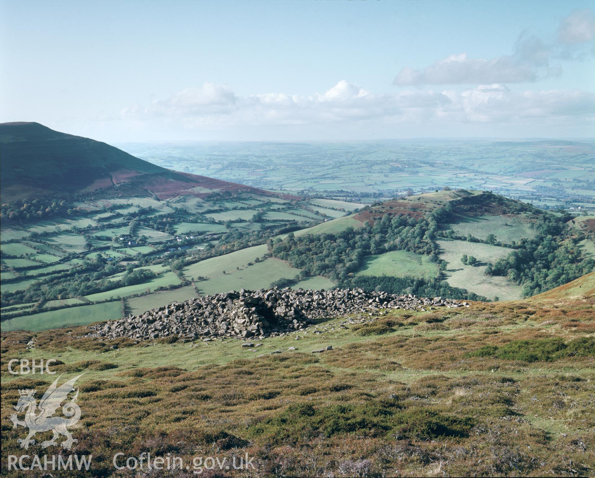 Colour transparency showing a view of ring cairn at Pen Trumau, produced by Iain Wright, c.1981