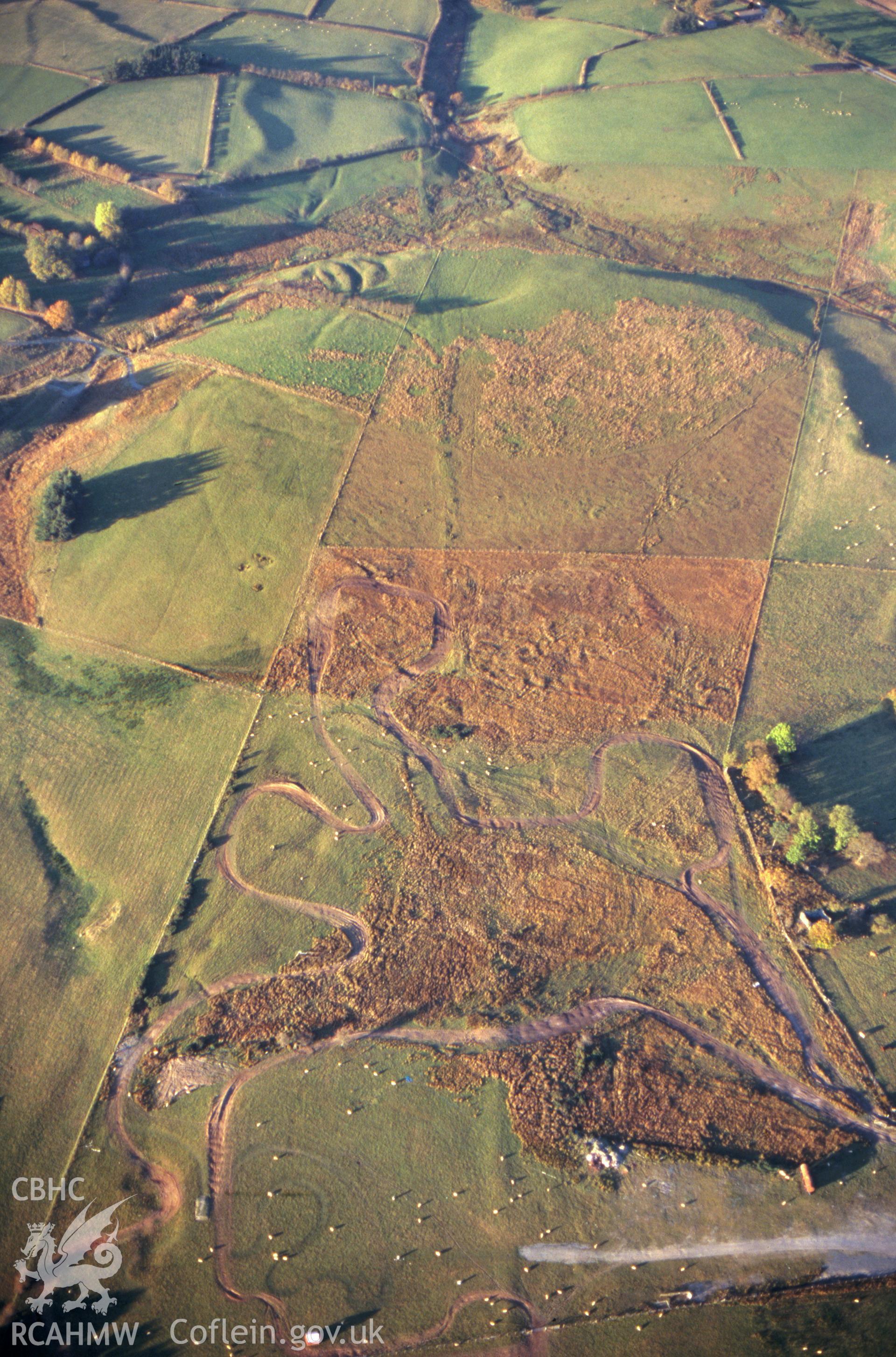 Slide of RCAHMW colour oblique aerial photograph of roman road at St Harmon, taken by Toby Driver, 2003.