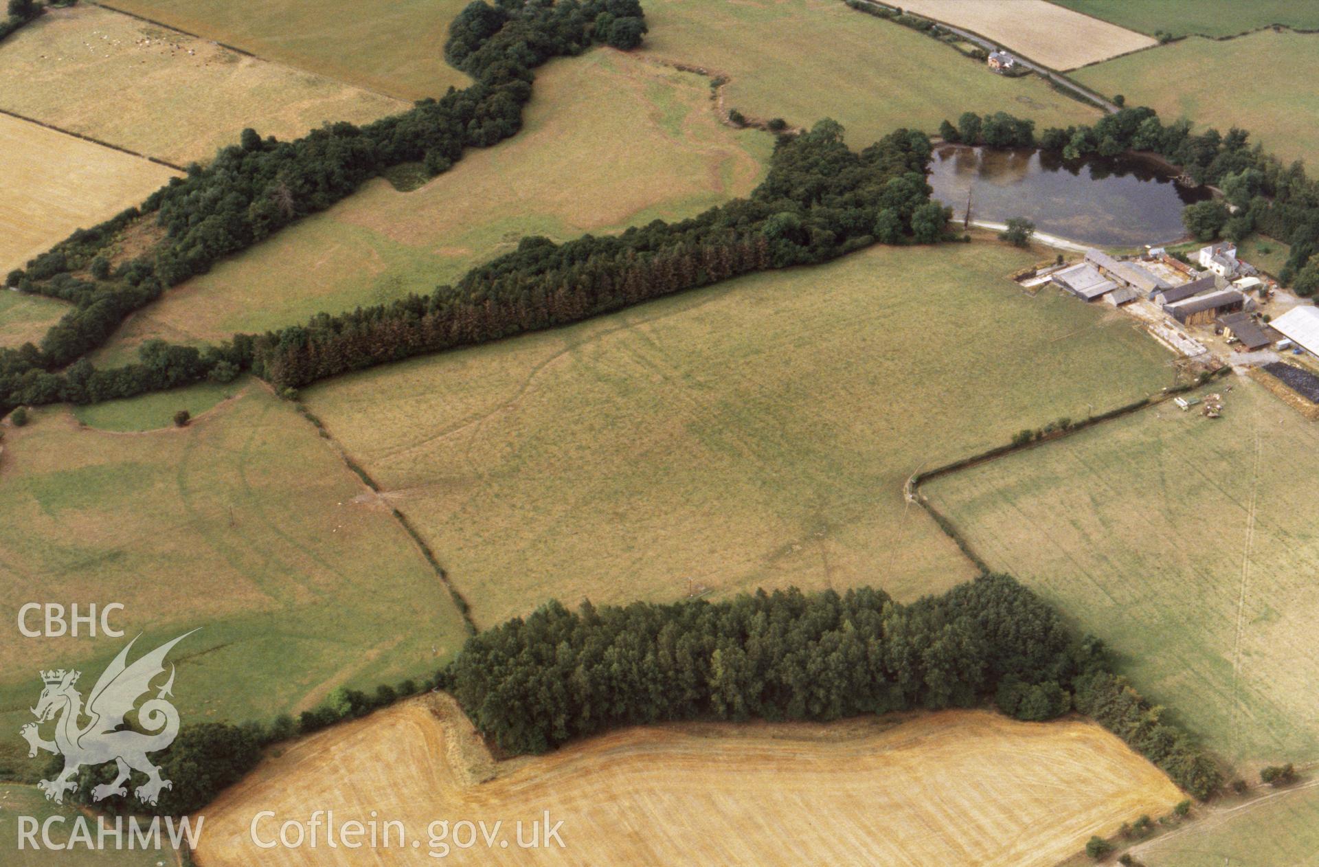 RCAHMW colour slide aerial photograph of Hindwell Farm and ditches. Taken by C R Musson on 03/09/1995