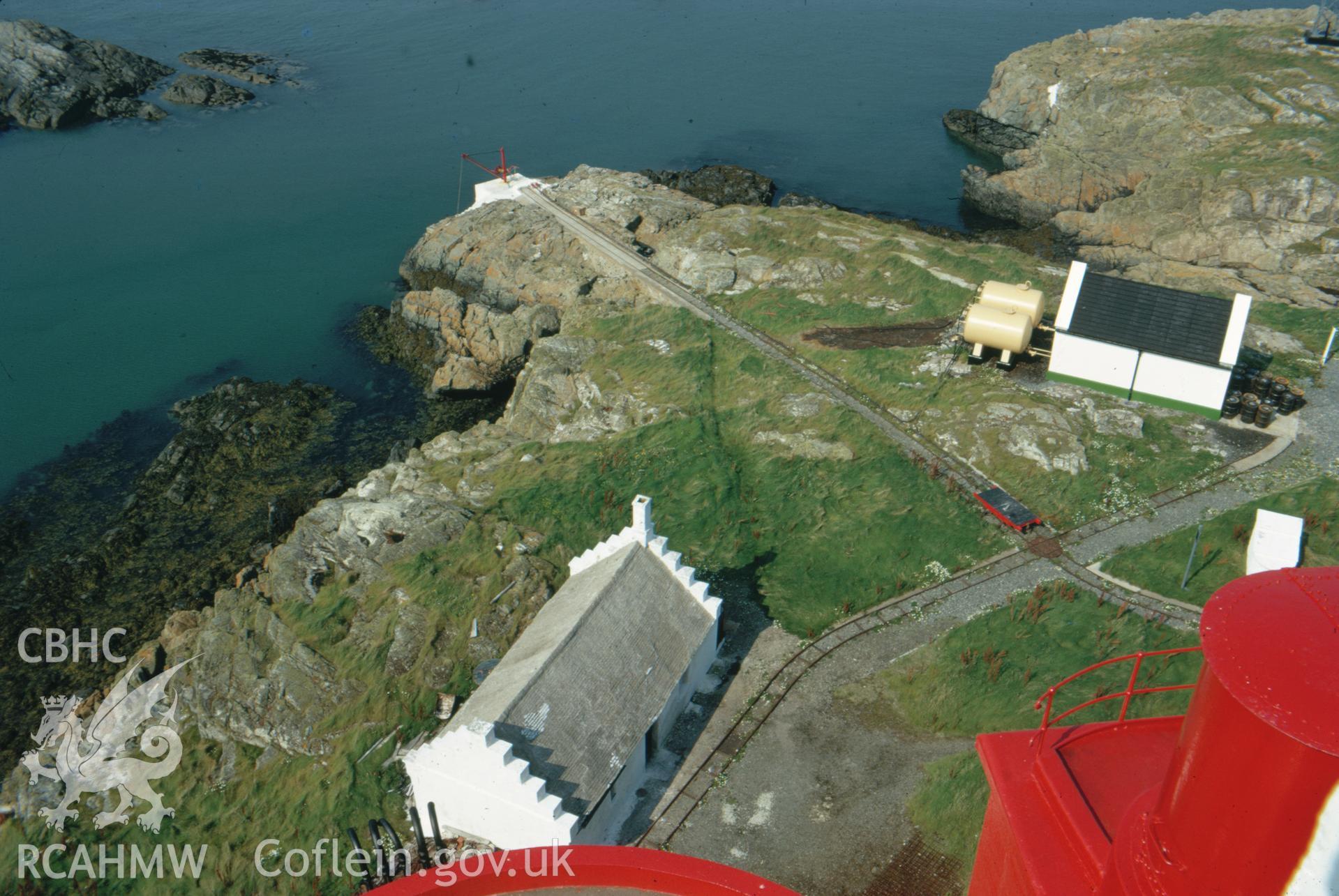 Colour slide showing a view looking down from the lantern to the cottage.