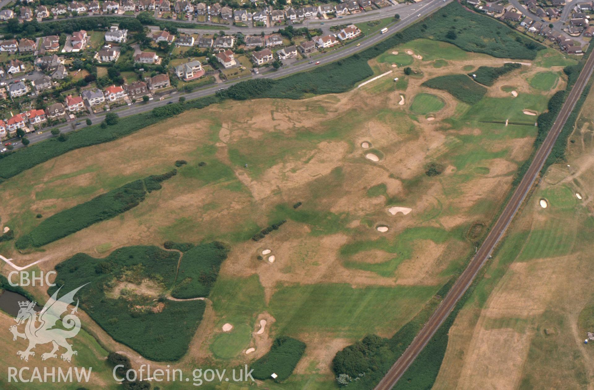 RCAHMW colour slide aerial photograph of Maesdu Golf Course, First World War practice trenches, parchmarks. Taken by Toby Driver on 15/07/2003