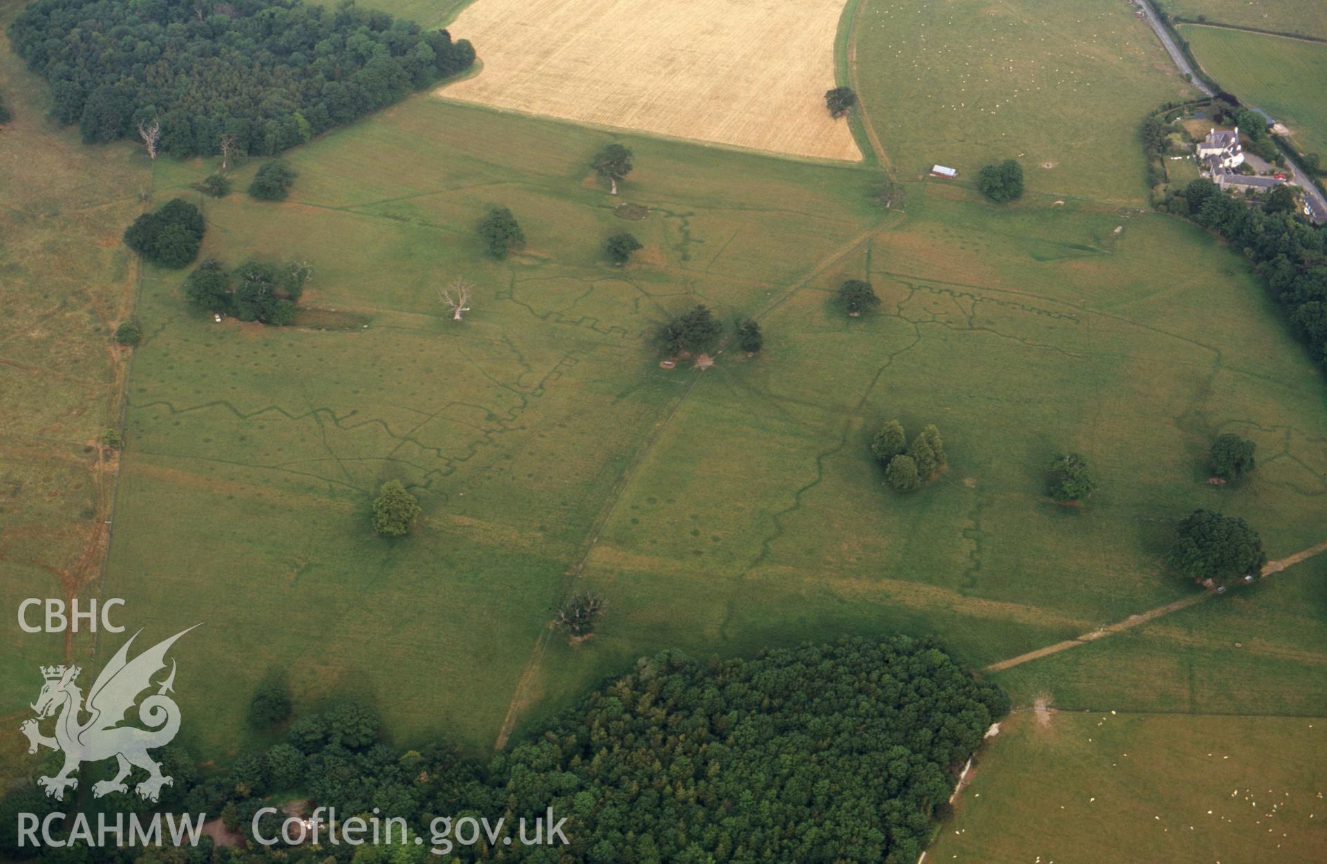 RCAHMW colour slide oblique aerial photograph of army practice trenches at Bodelwyddan Park, Bodelwyddan, taken by C.R.Musson on the 22/07/1996