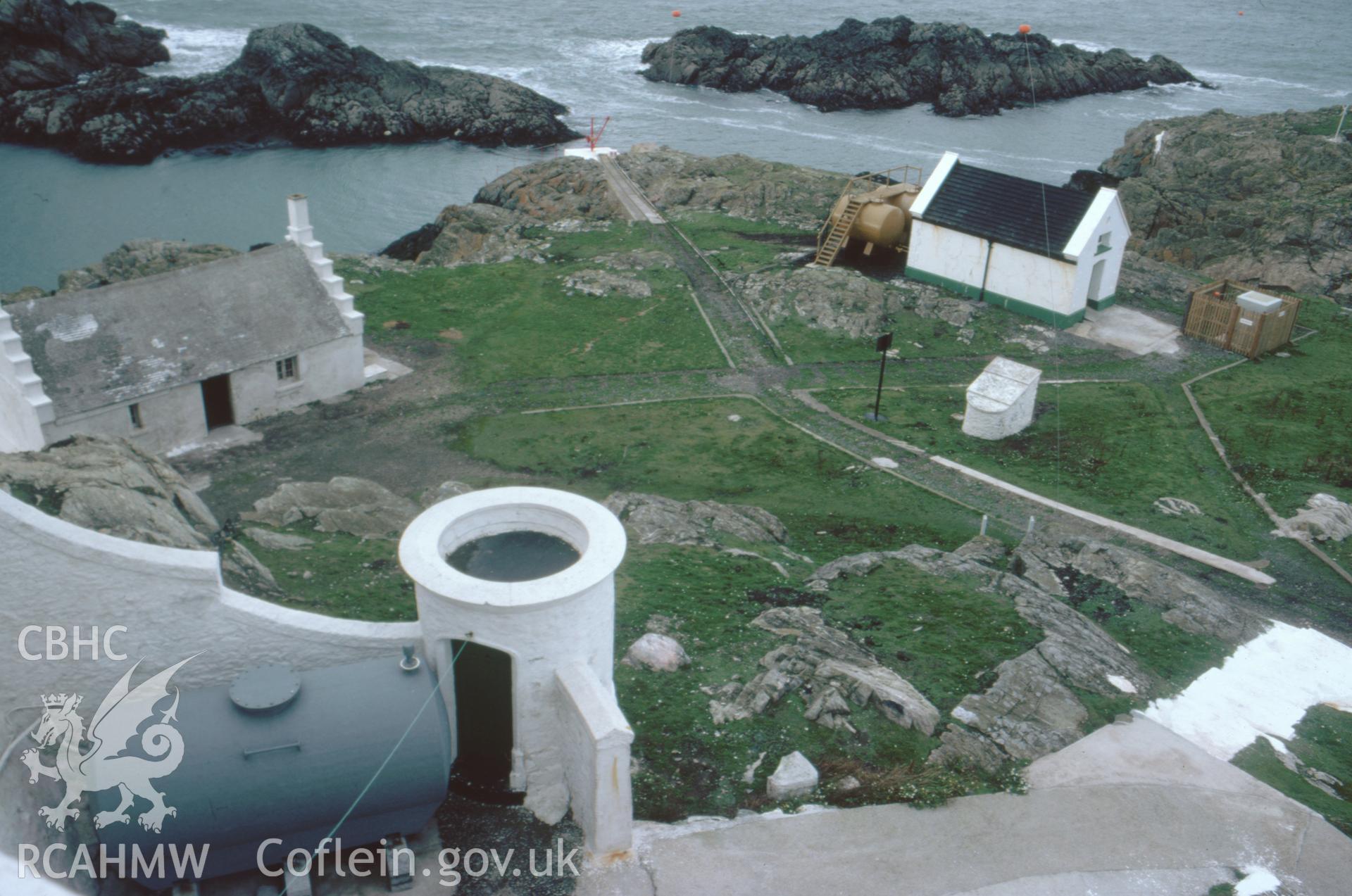 Colour slide showing the lighthouse, well and cottage.