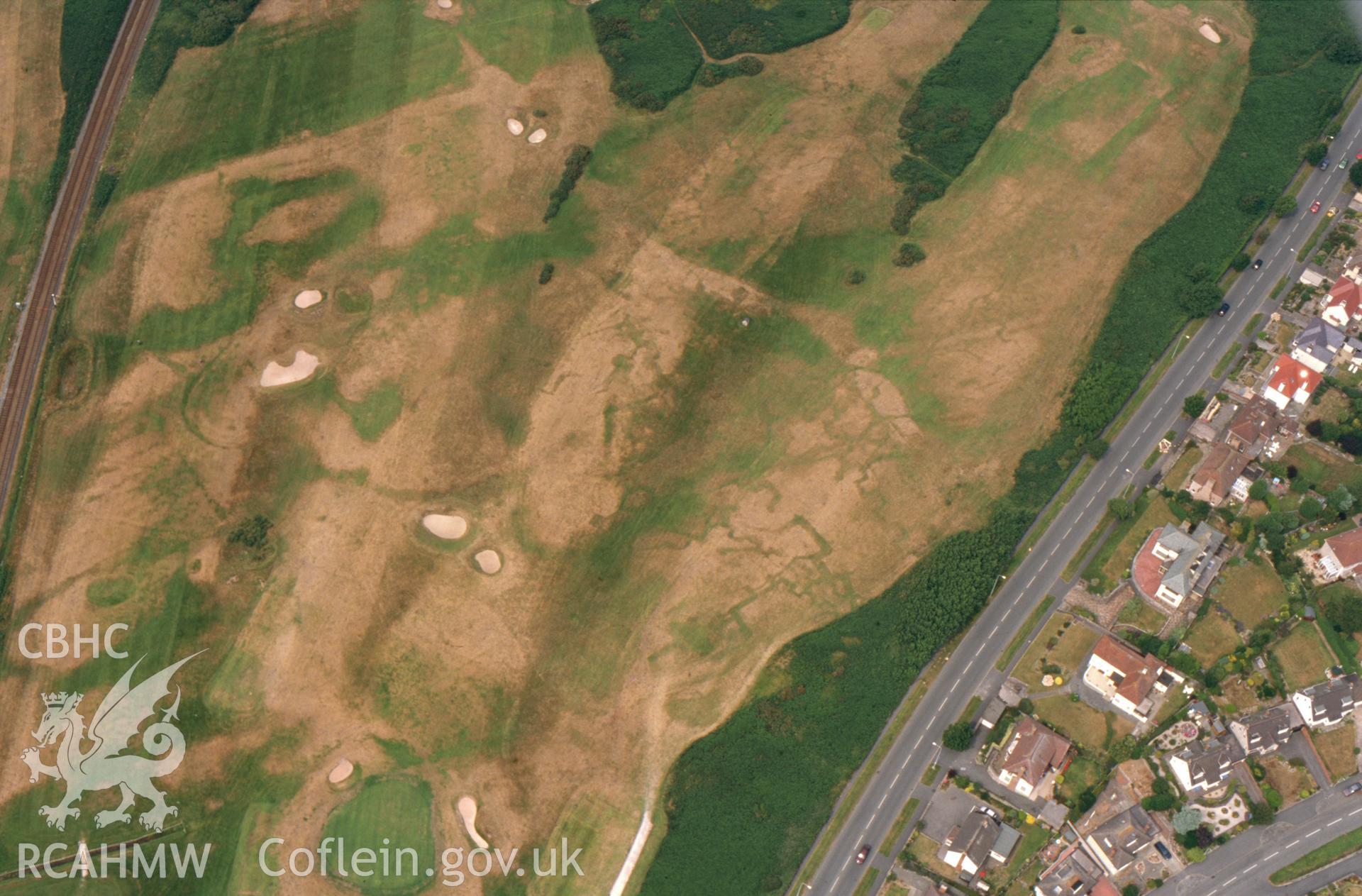 RCAHMW colour slide aerial photograph of Maesdu Golf Course, First World War practice trenches, parchmarks. Taken by Toby Driver on 15/07/2003