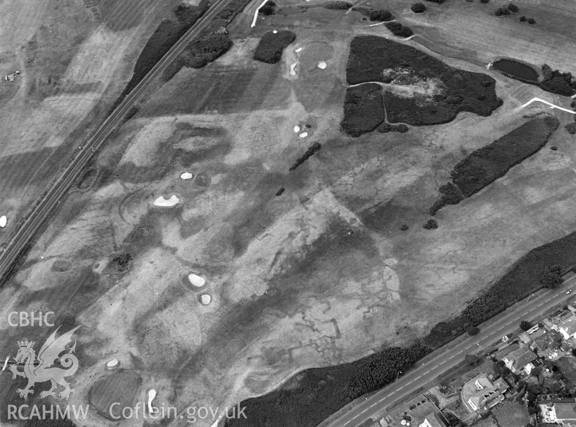 RCAHMW black and white aerial photograph of Maesdu Golf Course, First World War practice trenches, parchmarks. Taken by Toby Driver on 15/07/2003