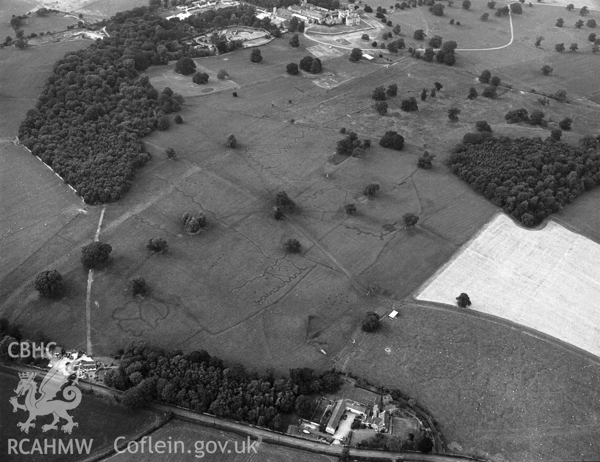 RCAHMW black and white oblique aerial photograph of Bodelwyddan Park Army Practice Trenches, taken by C R Musson, 22/07/1996.