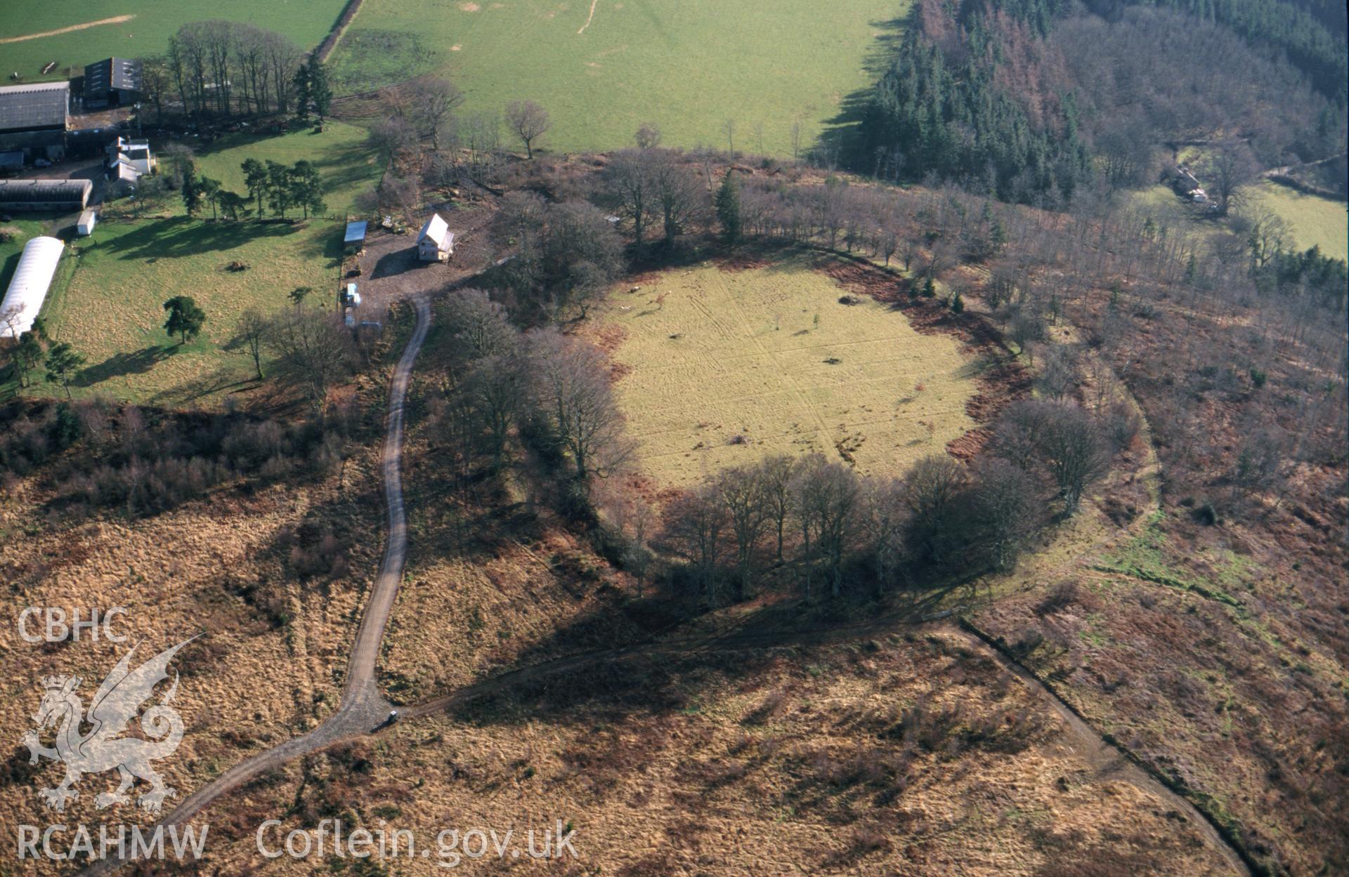 Slide of RCAHMW colour oblique aerial photograph of Castle Ring, Pen Offa, taken by T.G. Driver, 13/2/2001.