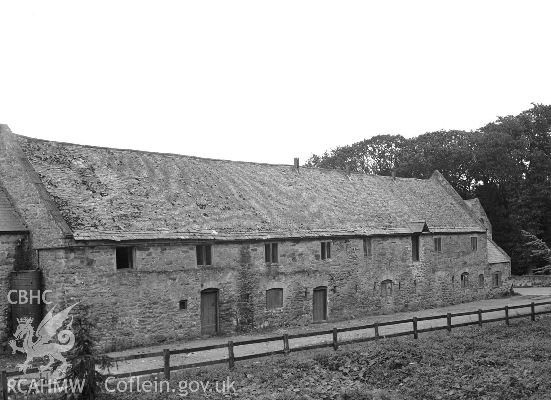 Exterior view of stable outbuildings at Mostyn Hall, Whitford, taken 15.05.1942.