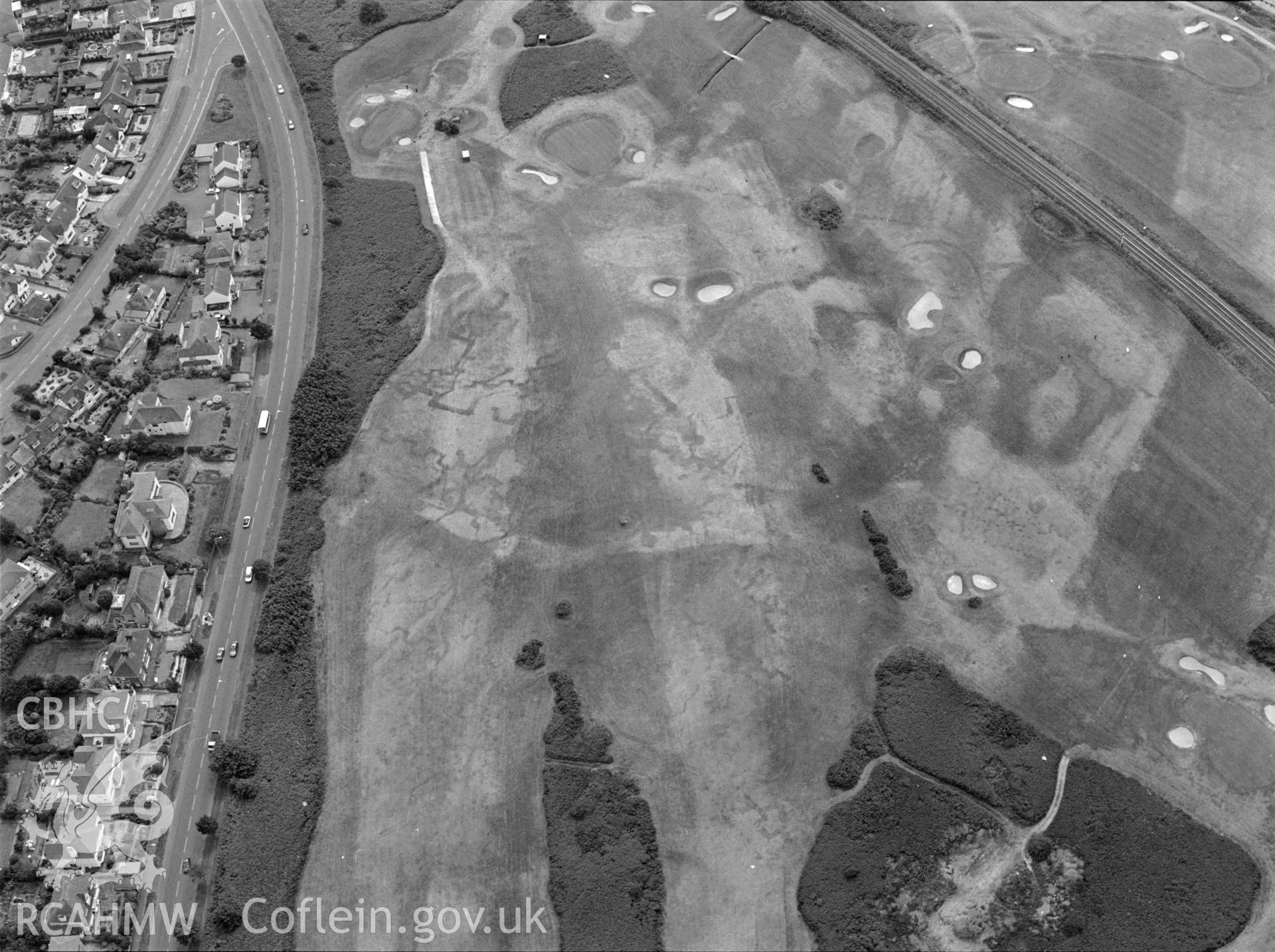 RCAHMW black and white aerial photograph of Maesdu Golf Course, First World War practice trenches, parchmarks. Taken by Toby Driver on 15/07/2003