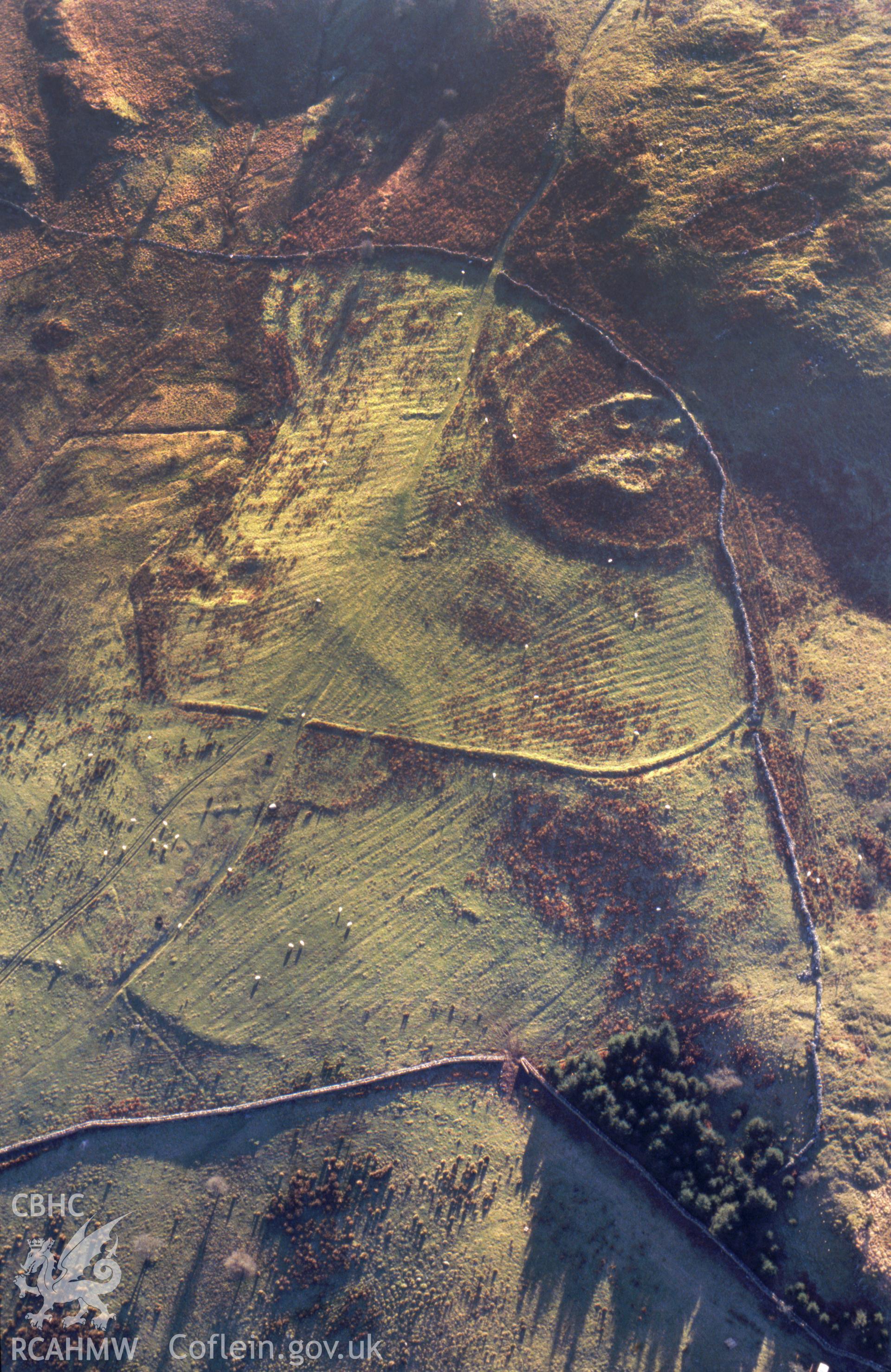 Slide of RCAHMW colour oblique aerial photograph of Ffridd Bod y Suddau settlement, taken by T.G. Driver, 2001.