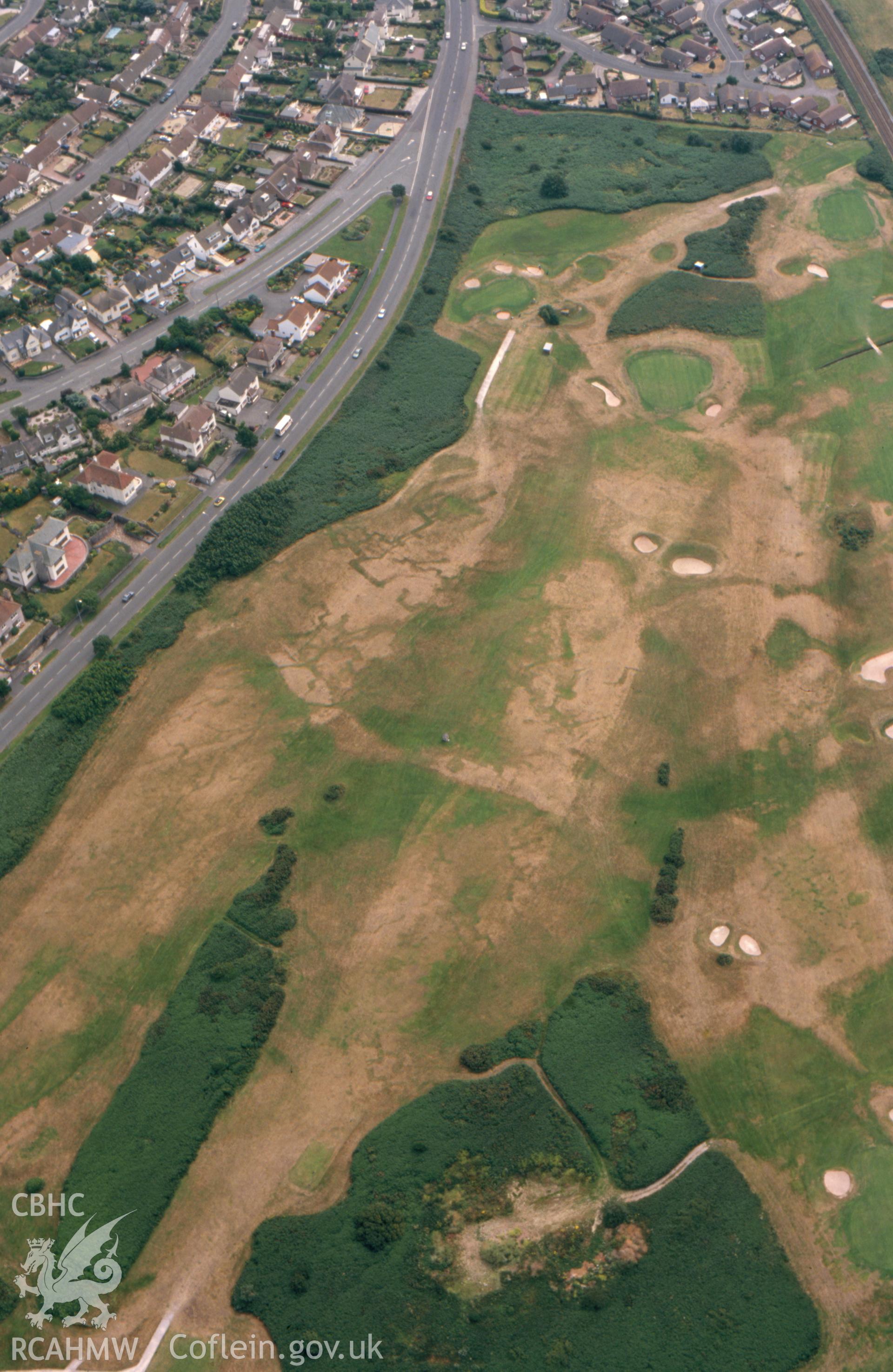 RCAHMW colour slide aerial photograph of Maesdu Golf Course, First World War practice trenches, parchmarks. Taken by Toby Driver on 15/07/2003