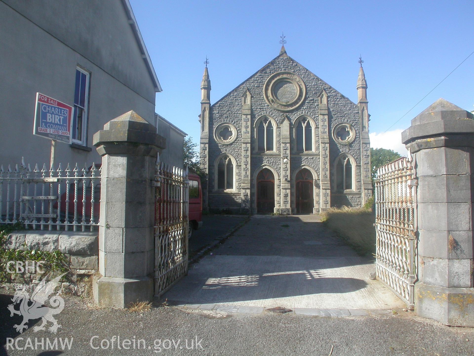 Main south-west show-front with entrance gate and railings by Thomas Thomas.