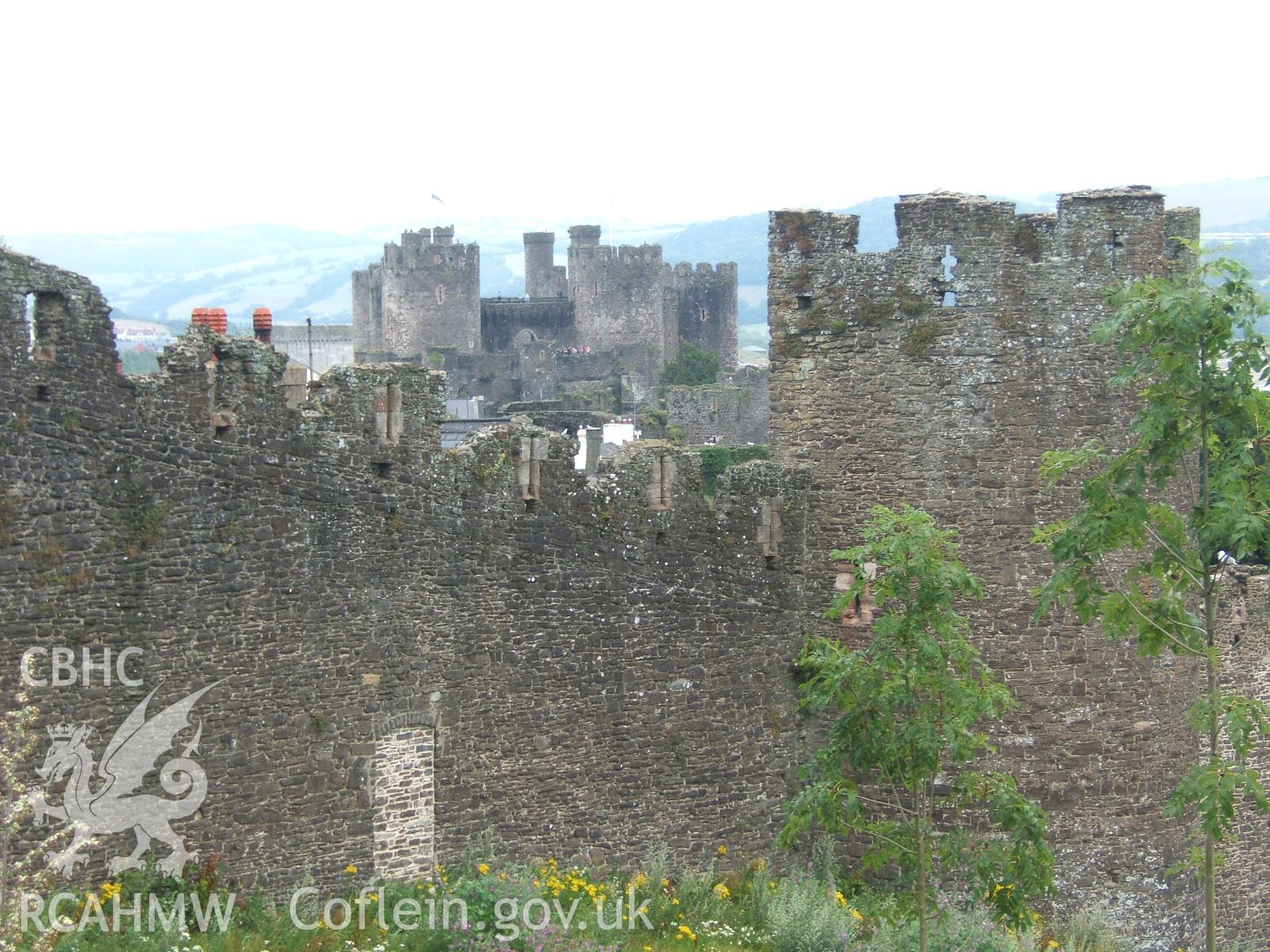 Wall to south-west of gate with Conwy Castle and estuary visible over the walled town.