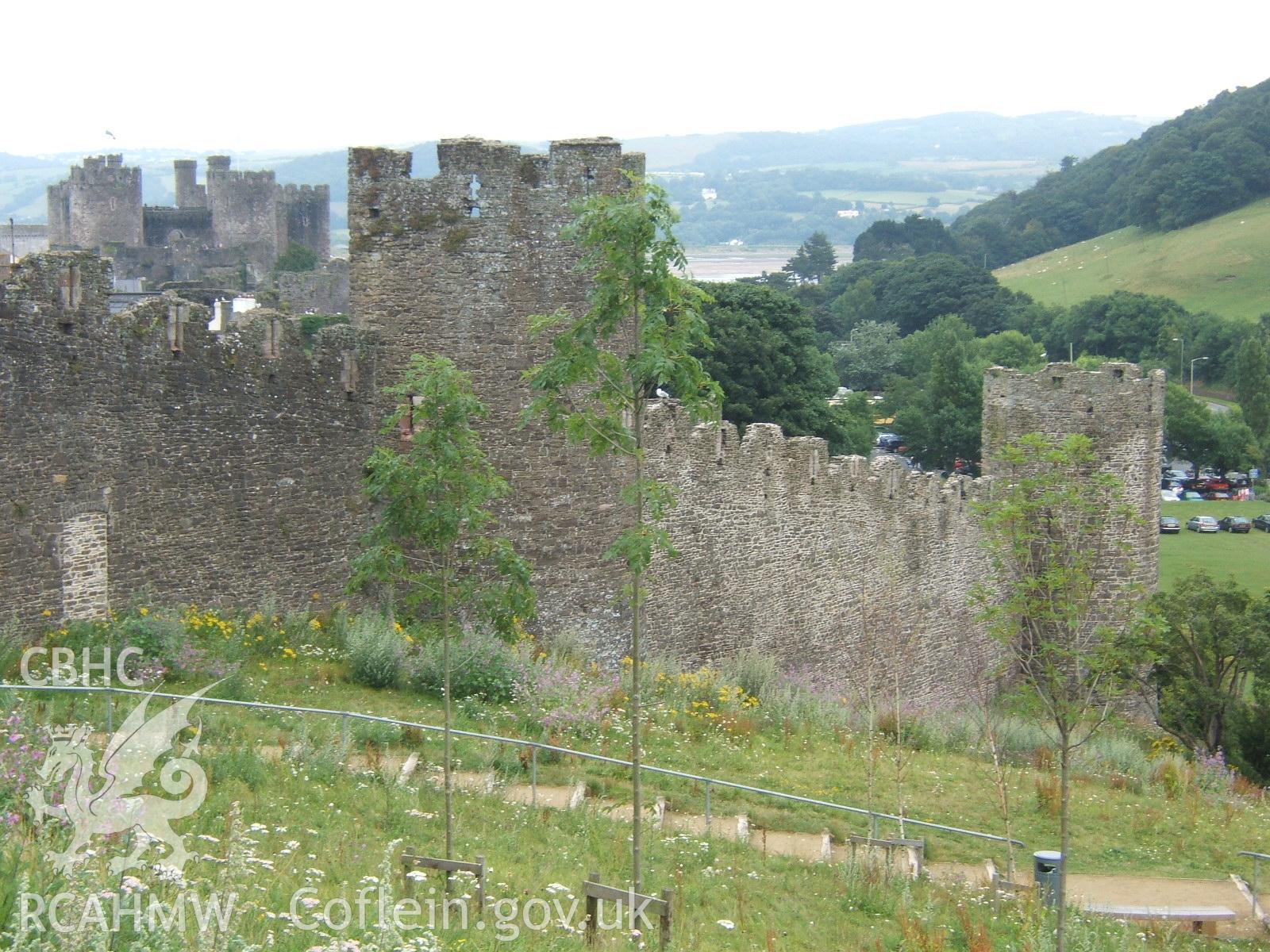 Looking to south corner of walls with castle in the distance.