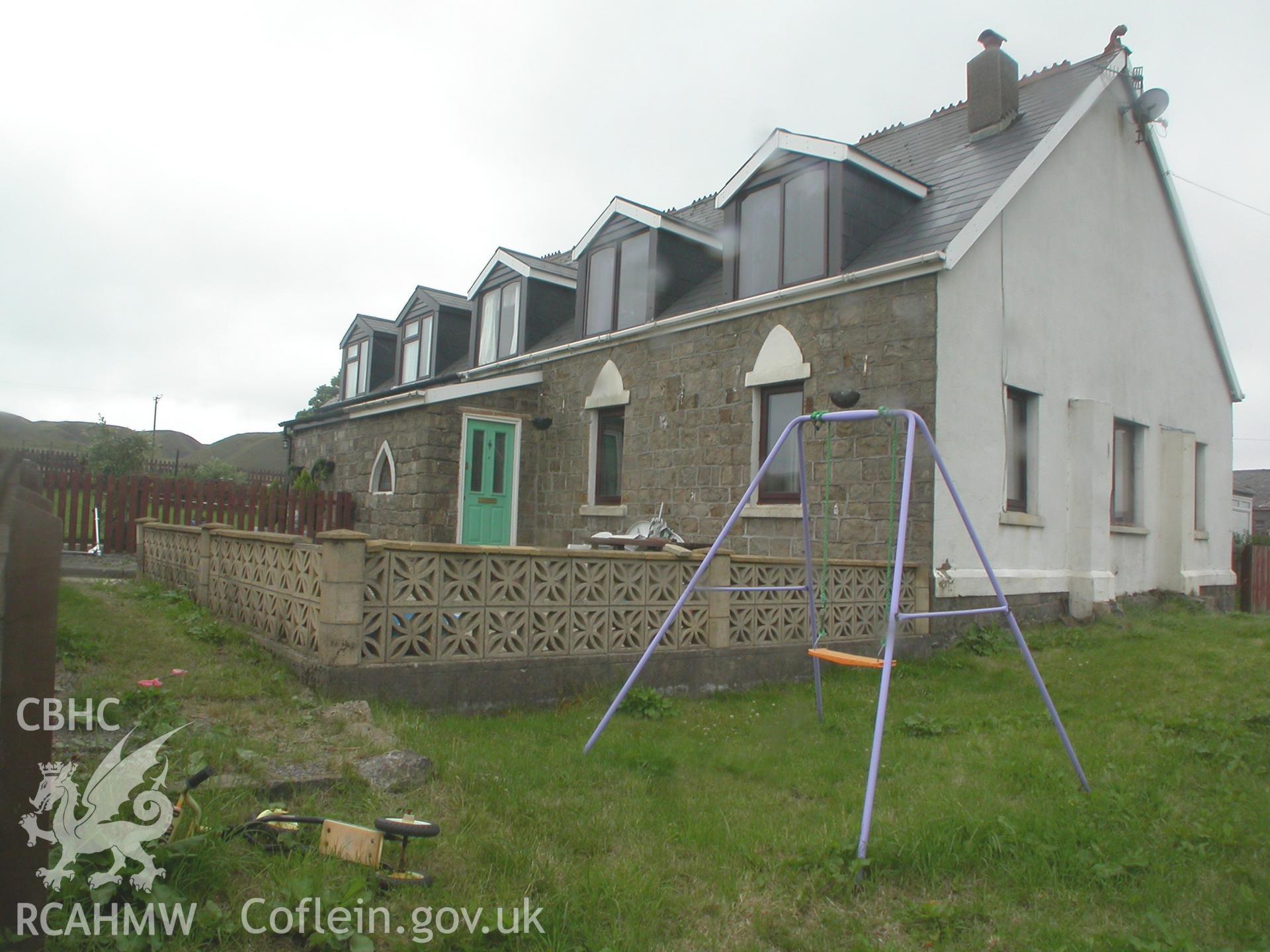 North-west side and south-west gable facades.