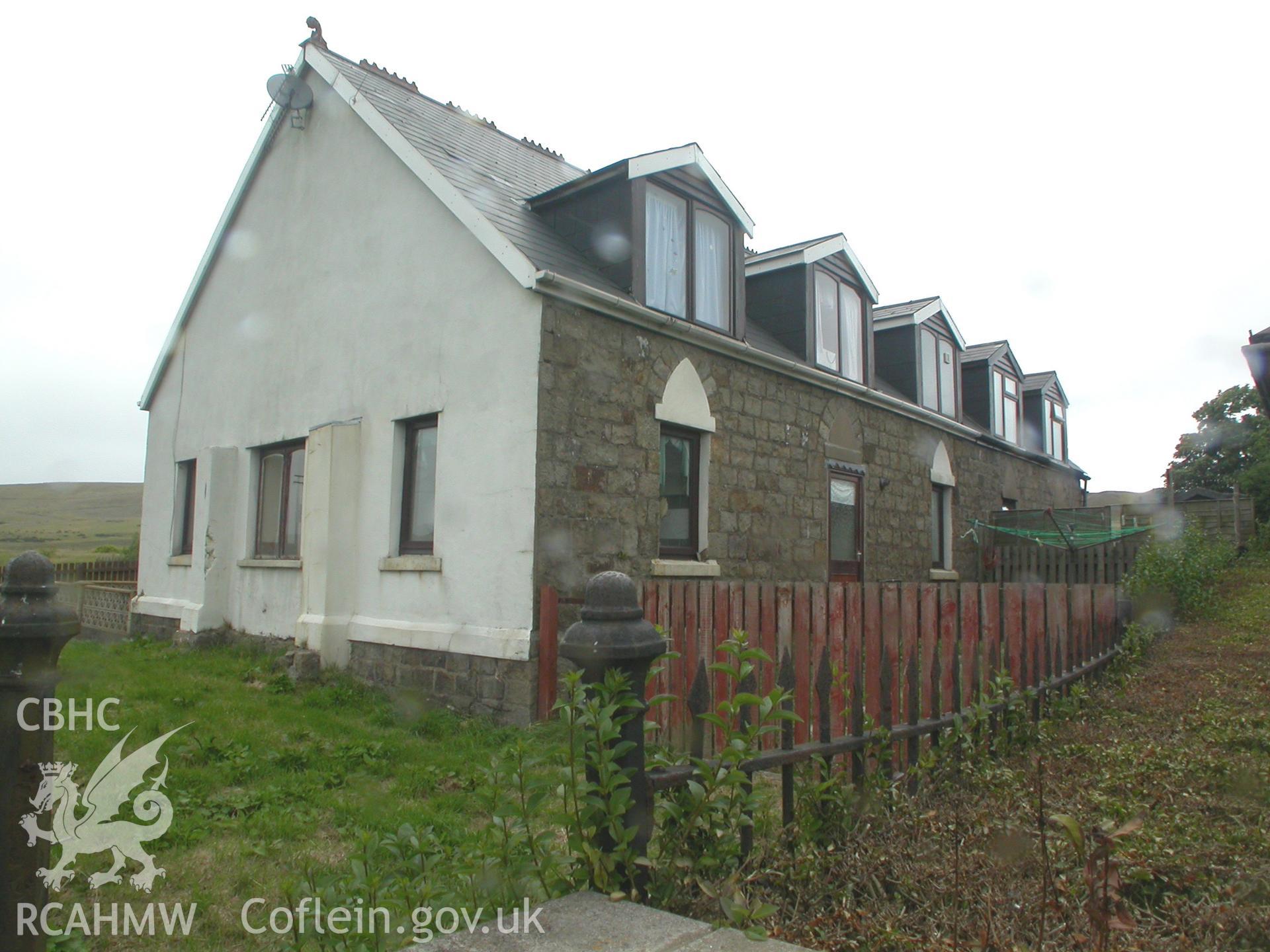 South-east side and south-west gable facades.