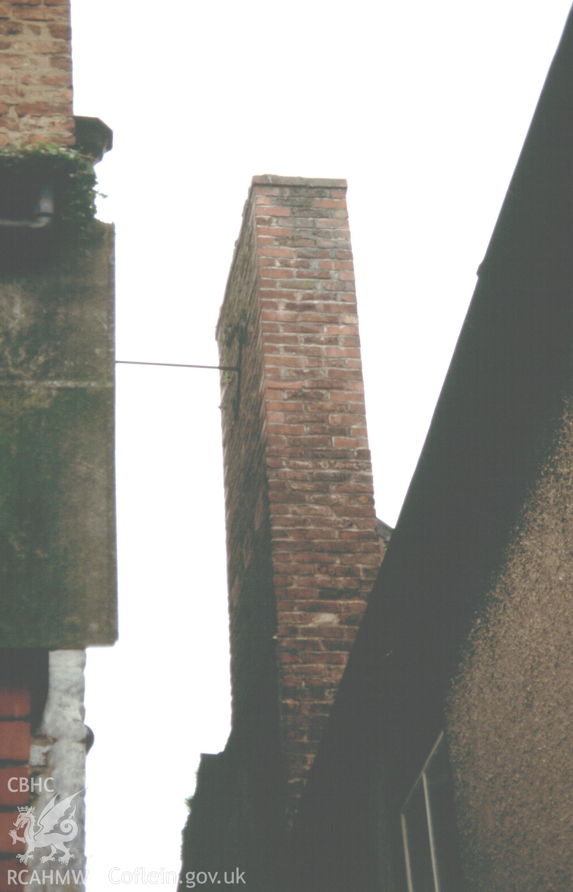 Chimney against side passage.