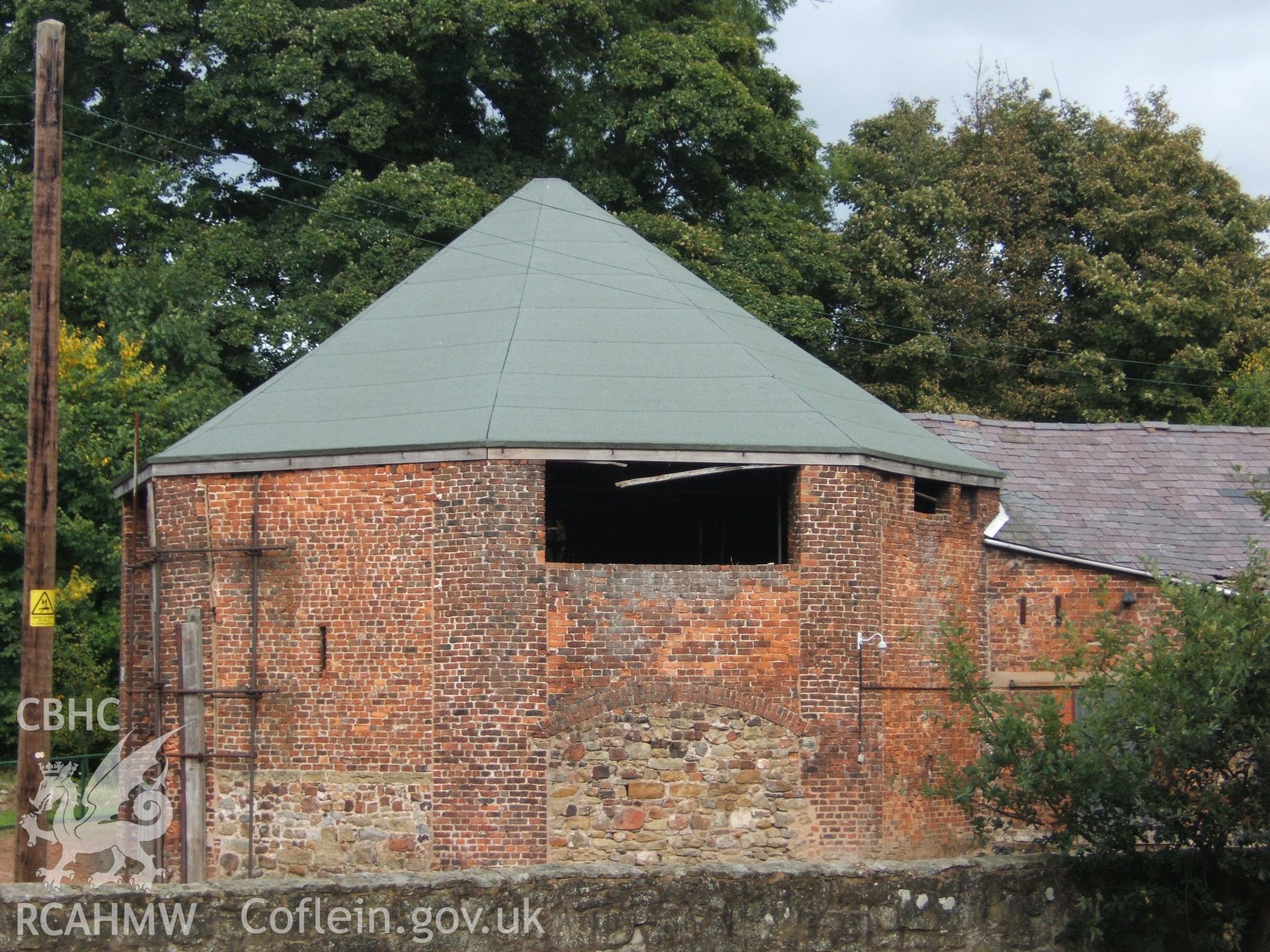 Casting house from south-west, fettling shop to right.