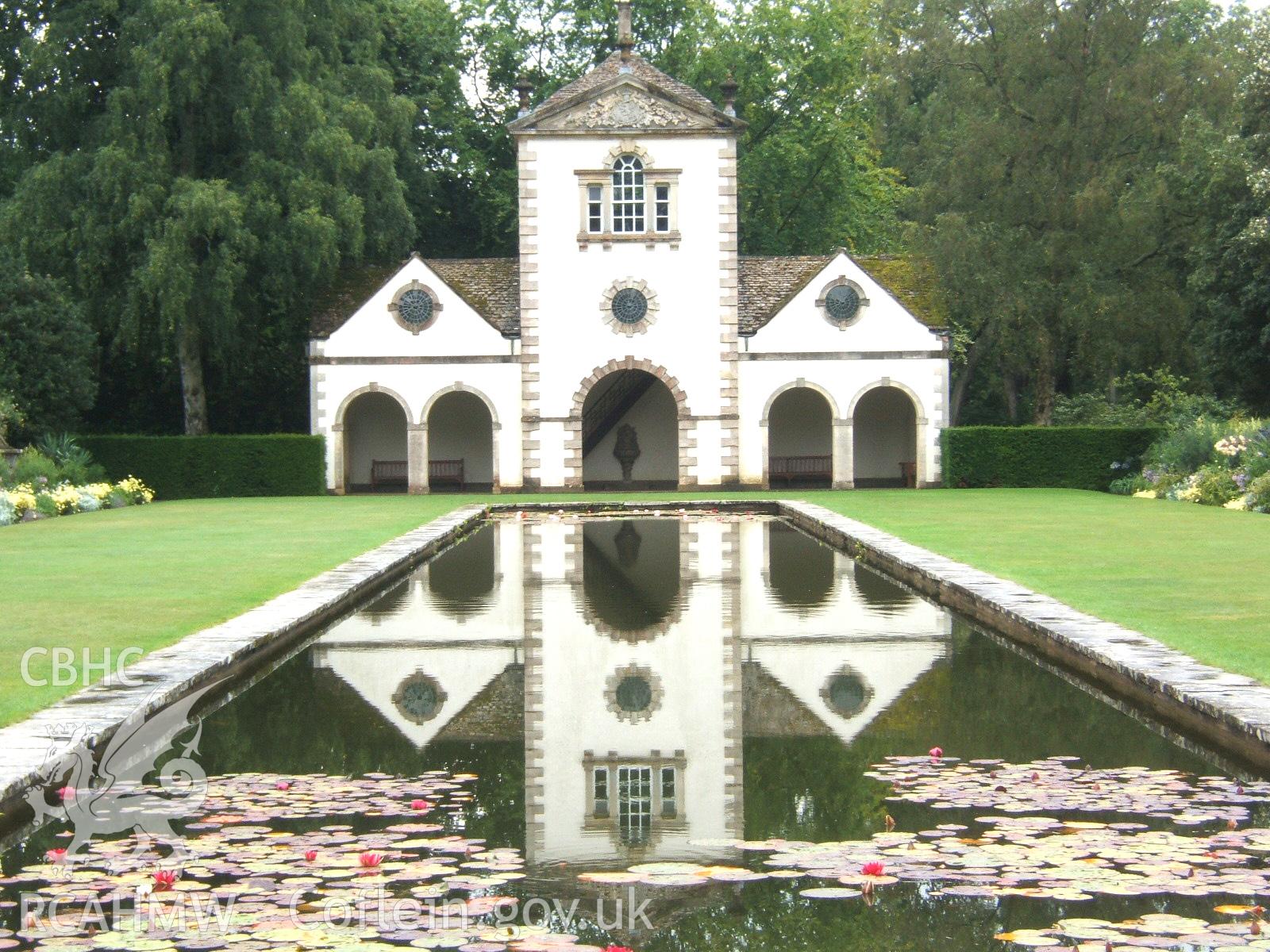 The Pin Mill reflected in the Long Canal, from the north-west.