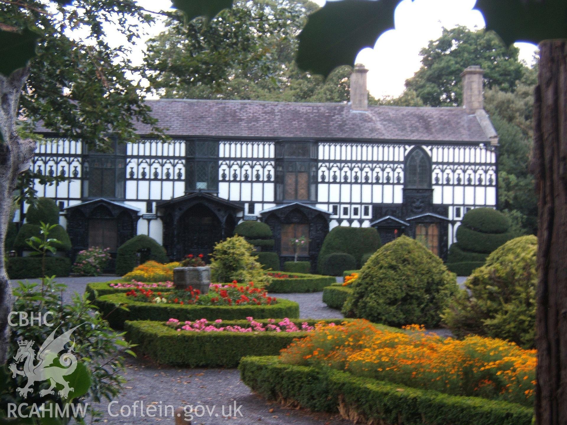 Main south-west entrance front with flower garden.