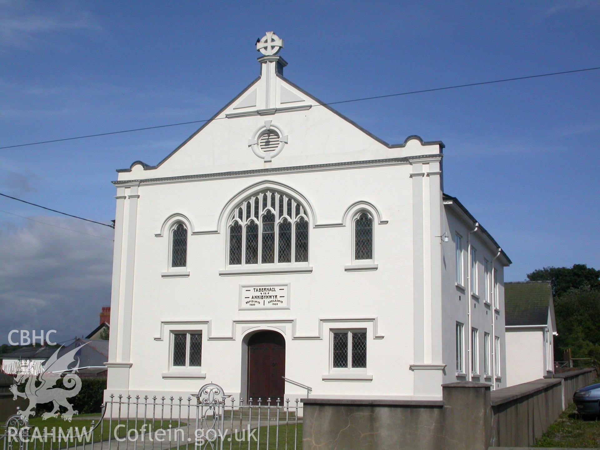 NW front and SW side showing Perpendicular window and plain side.