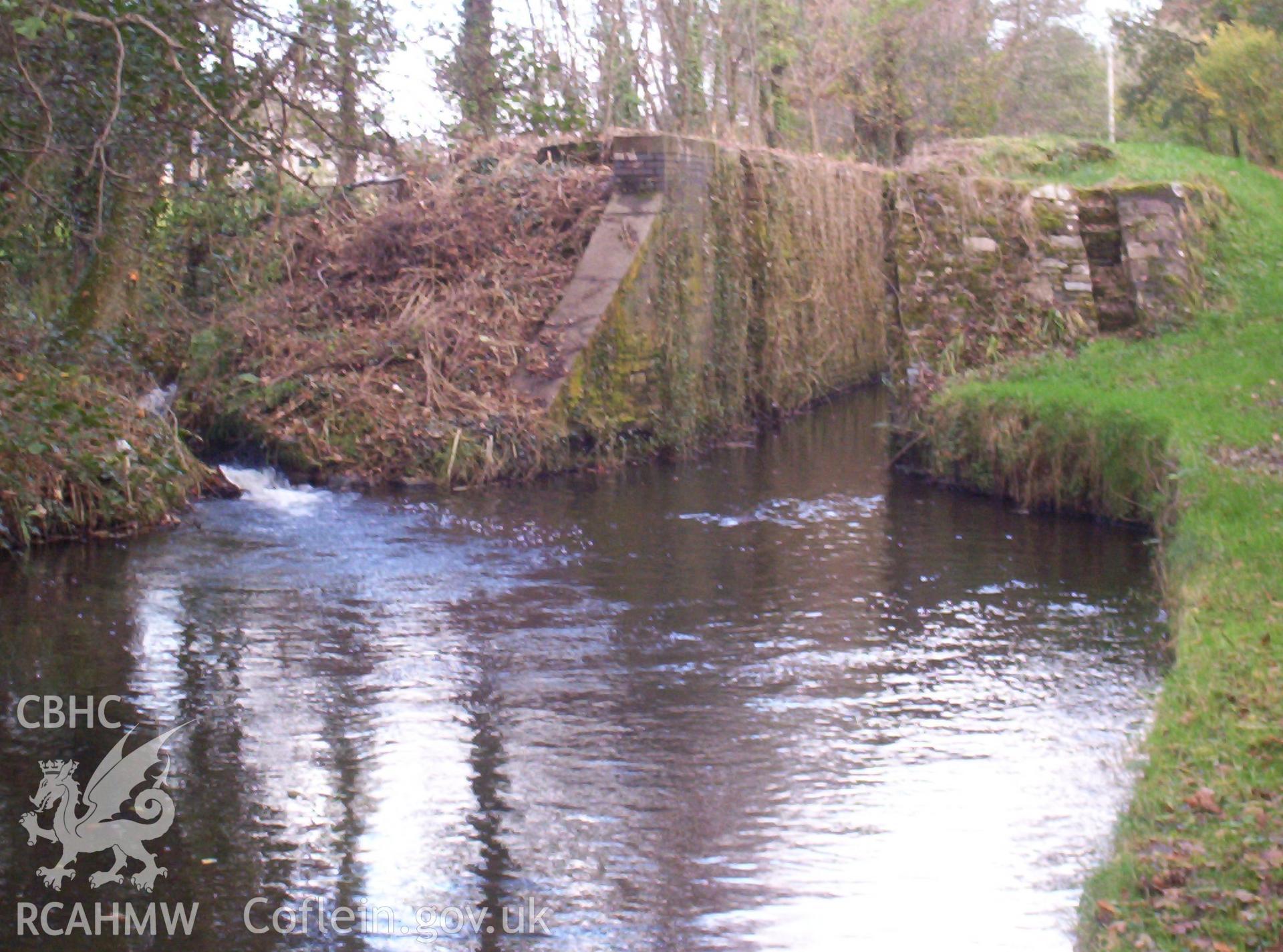 Toe of Lock 13 with steps and water bypass (left) from the south.