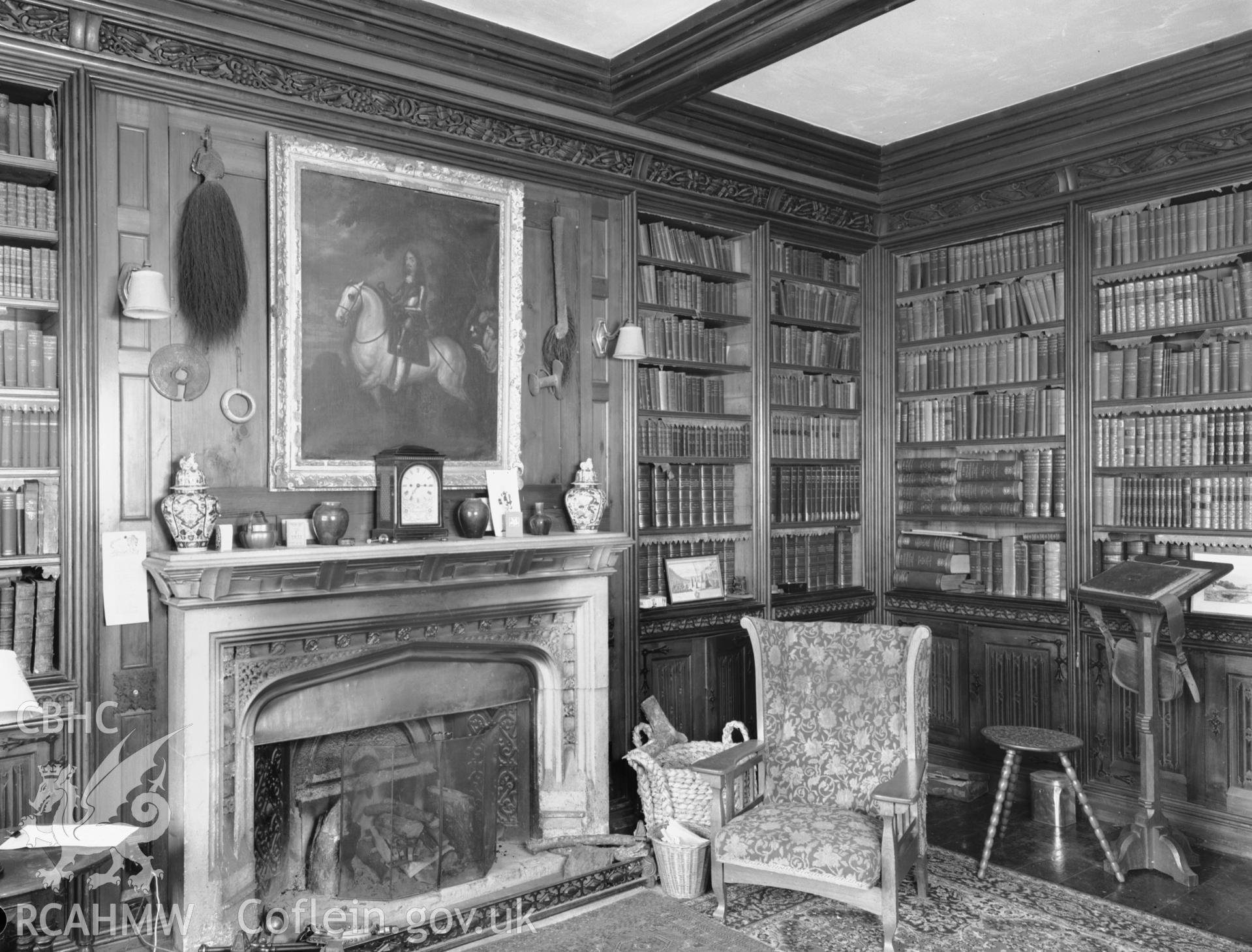 The fireplace in the library at Treberfedd House.