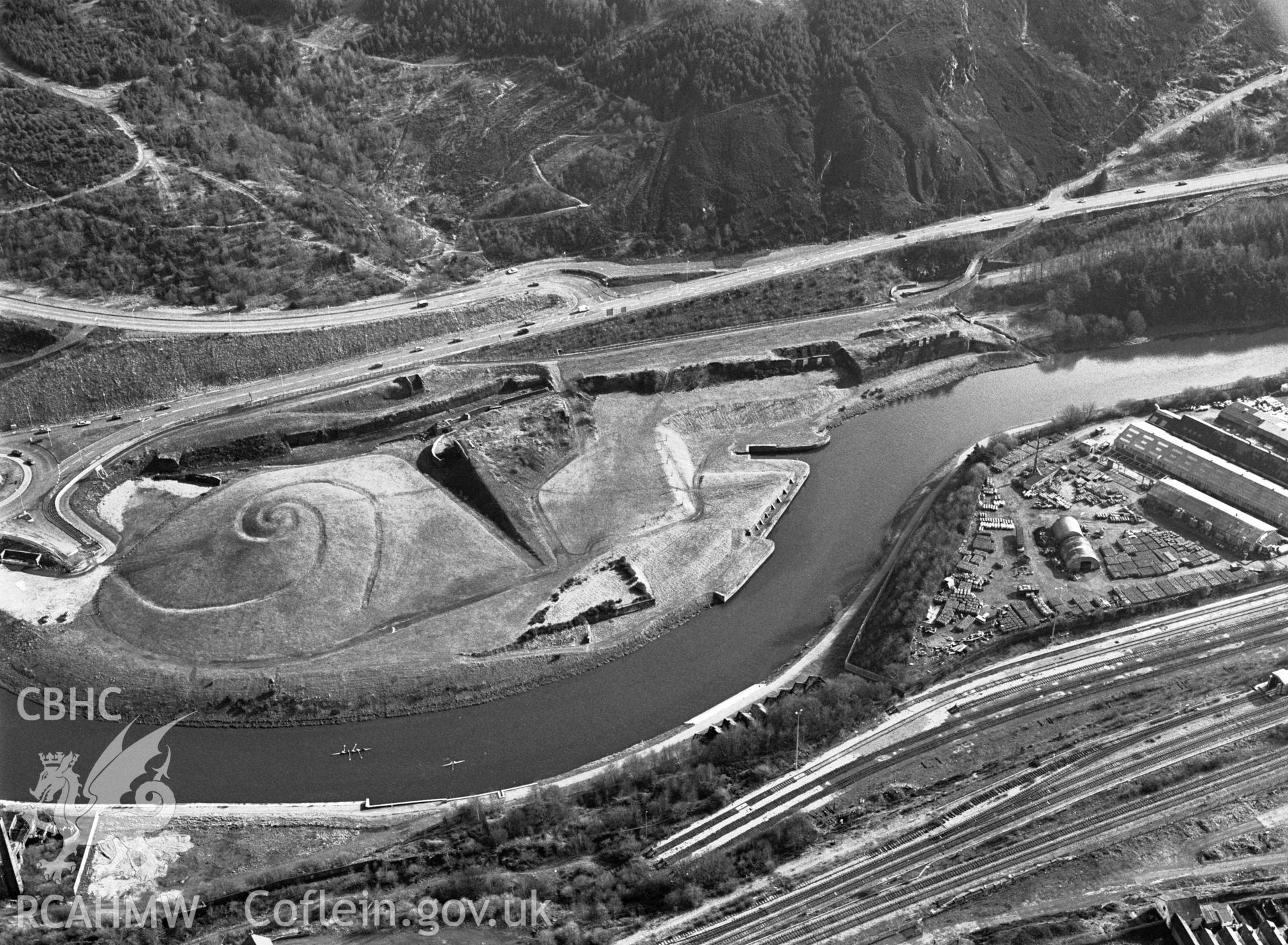 RCAHMW Black and white oblique aerial photograph of Middle Bank Copperworks, Swansea, Bonymaen, taken by C.R.Musson on the 15/02/1997