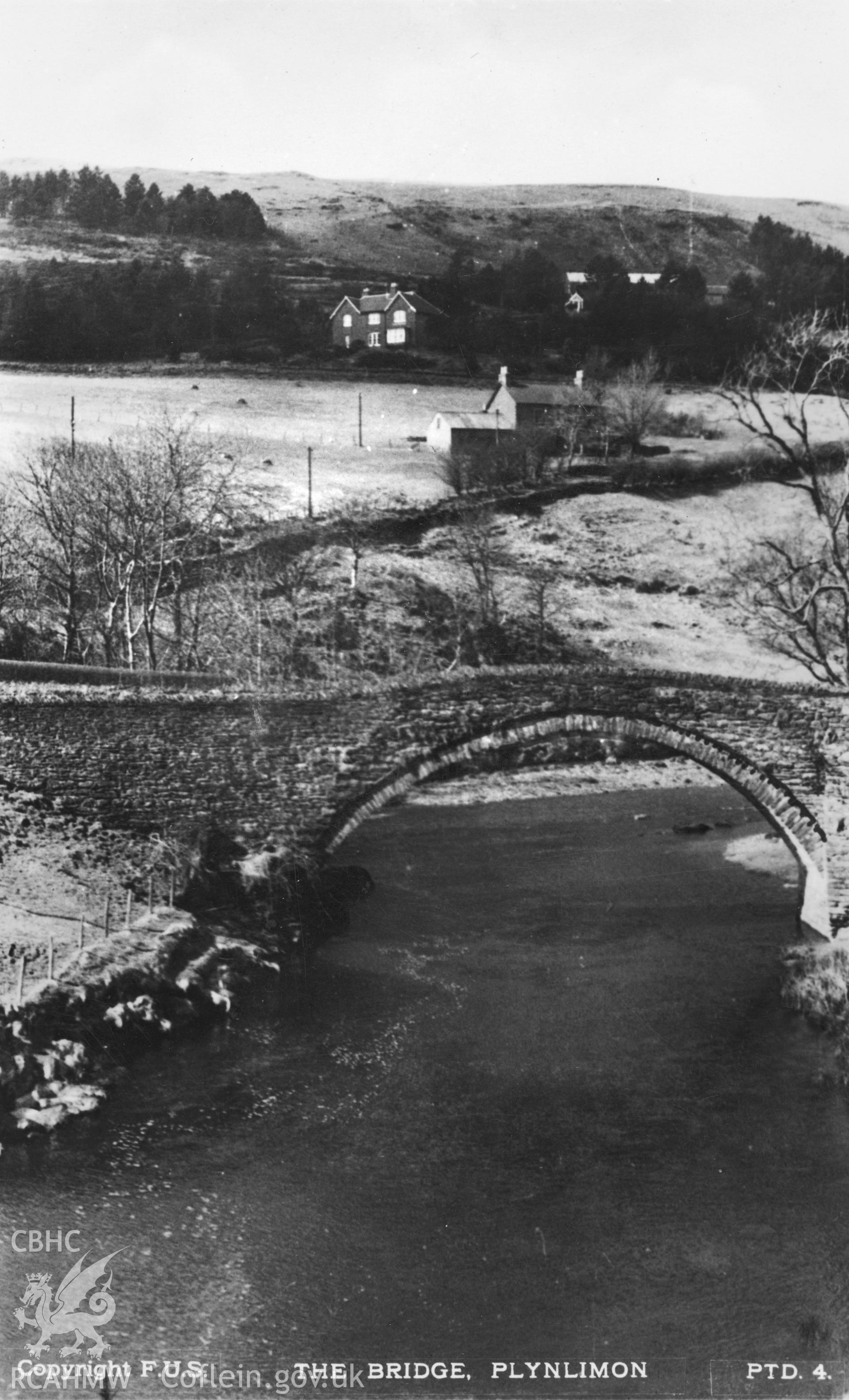 Digital copy of postcard showing 'The Bridge, Ponterwyd, Plynlimon, dated early 20th century, [annotation: 'big house: Cartrefle, in woods: Ainslow Lodge'].  Loaned for copying by Charlie Downes.