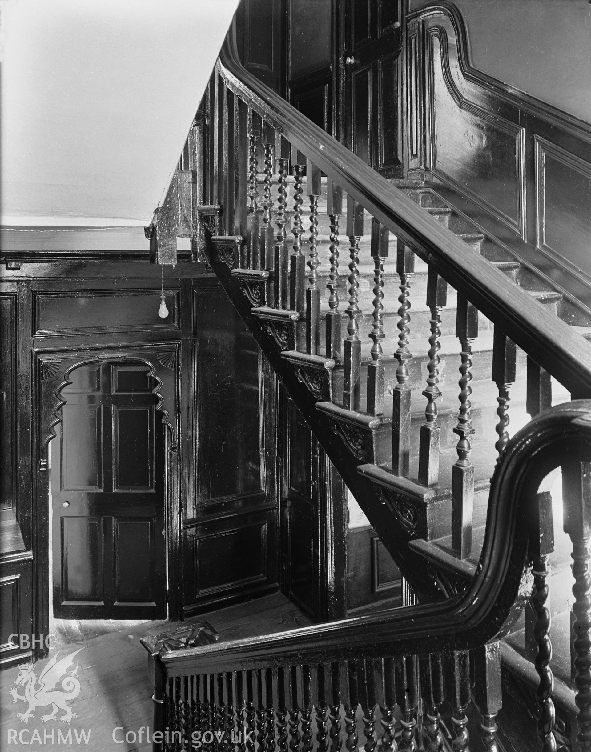 Interior view showing staircase between first and second floors of Rhyd y Gors House.