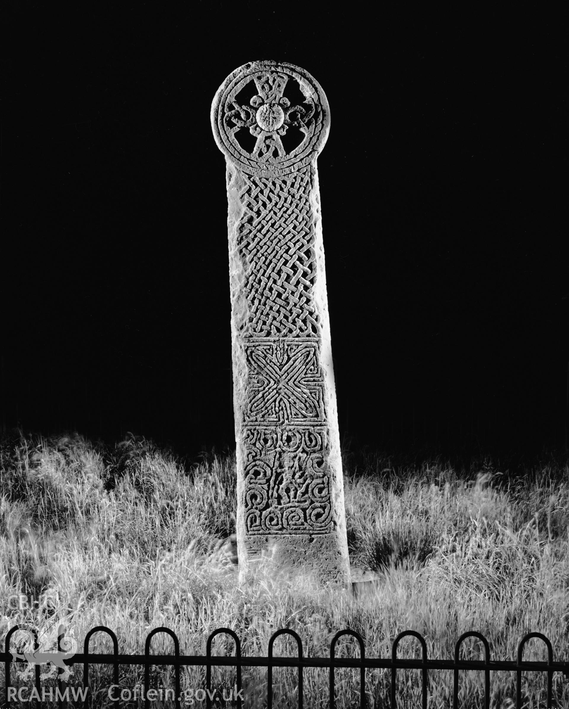 Cross on dark ground. (portrait)