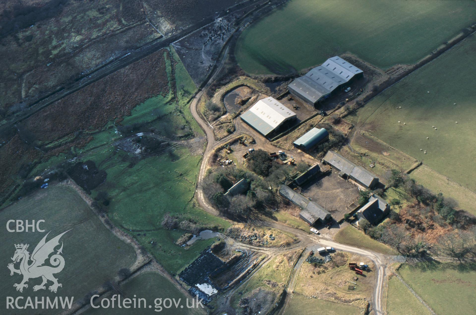 RCAHMW colour slide oblique aerial photograph of St John The Baptist's Church, Morvil, Puncheston, taken by C.R.Musson on the 27/02/1996