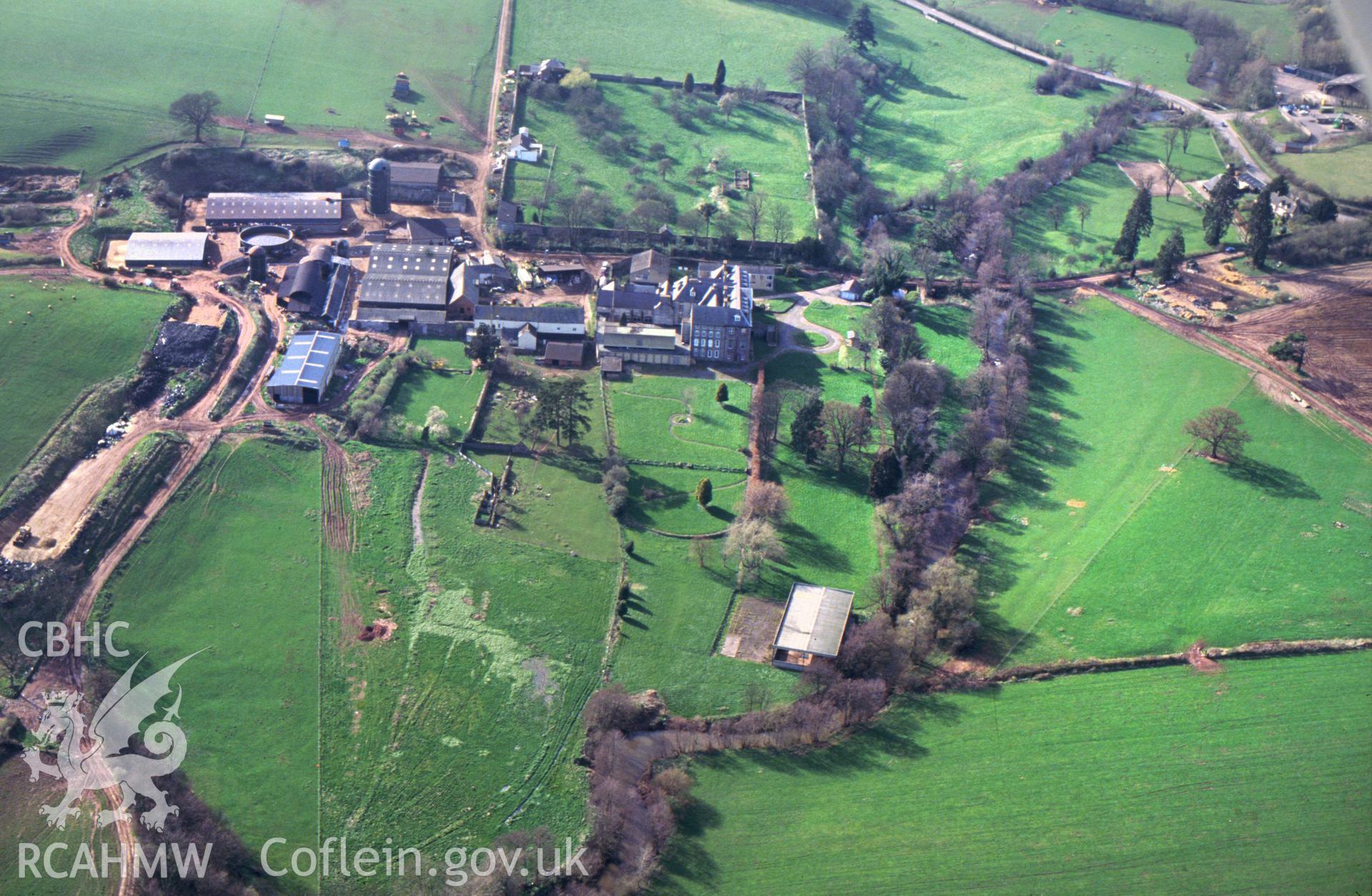 RCAHMW colour slide oblique aerial photograph of Troy House Garden, Mitchel Troy, taken by C.R. Musson, 24/03/94