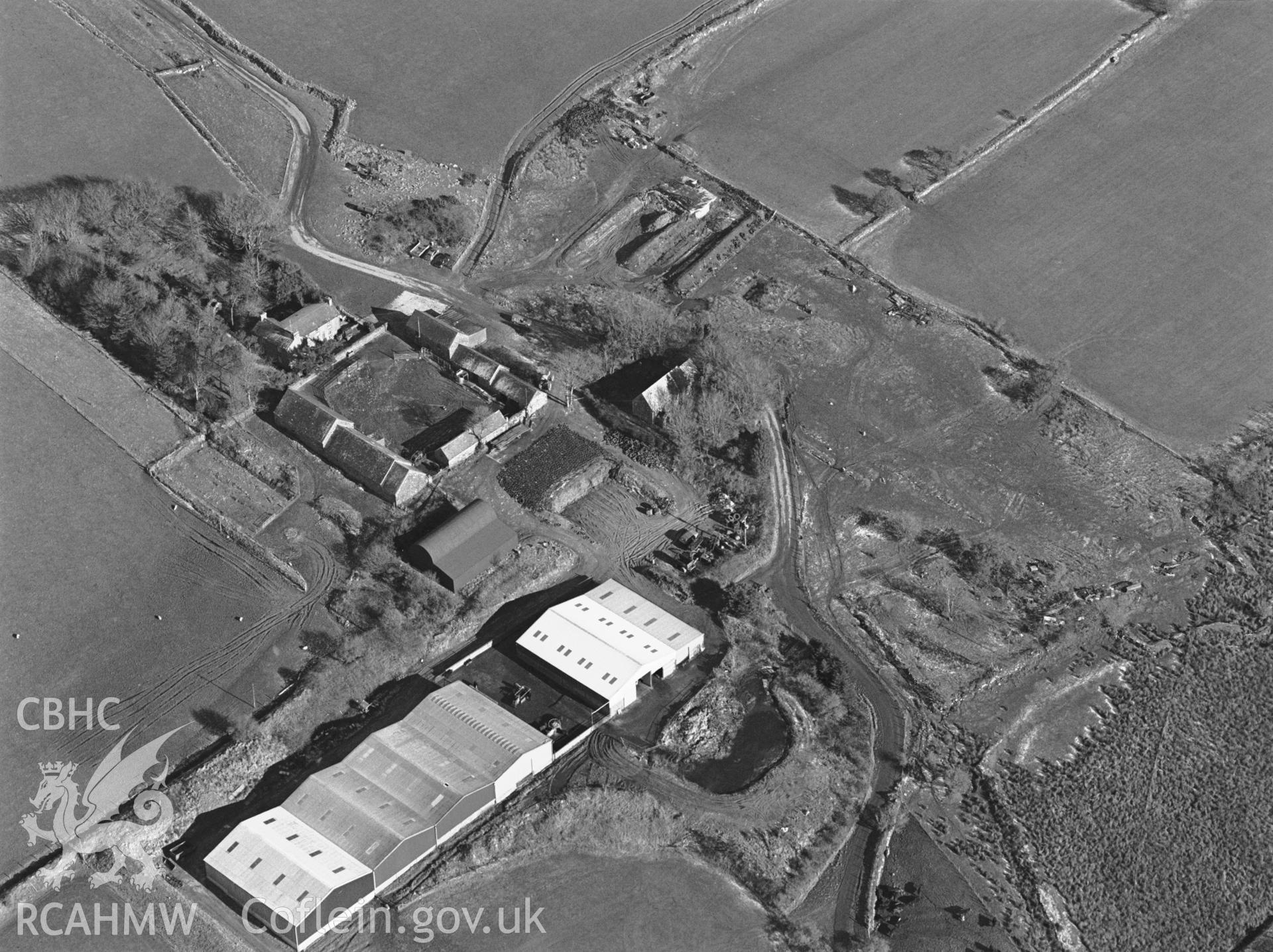 RCAHMW black and white oblique aerial photograph of Morvil Churchyard, taken by Toby Driver on 2004.