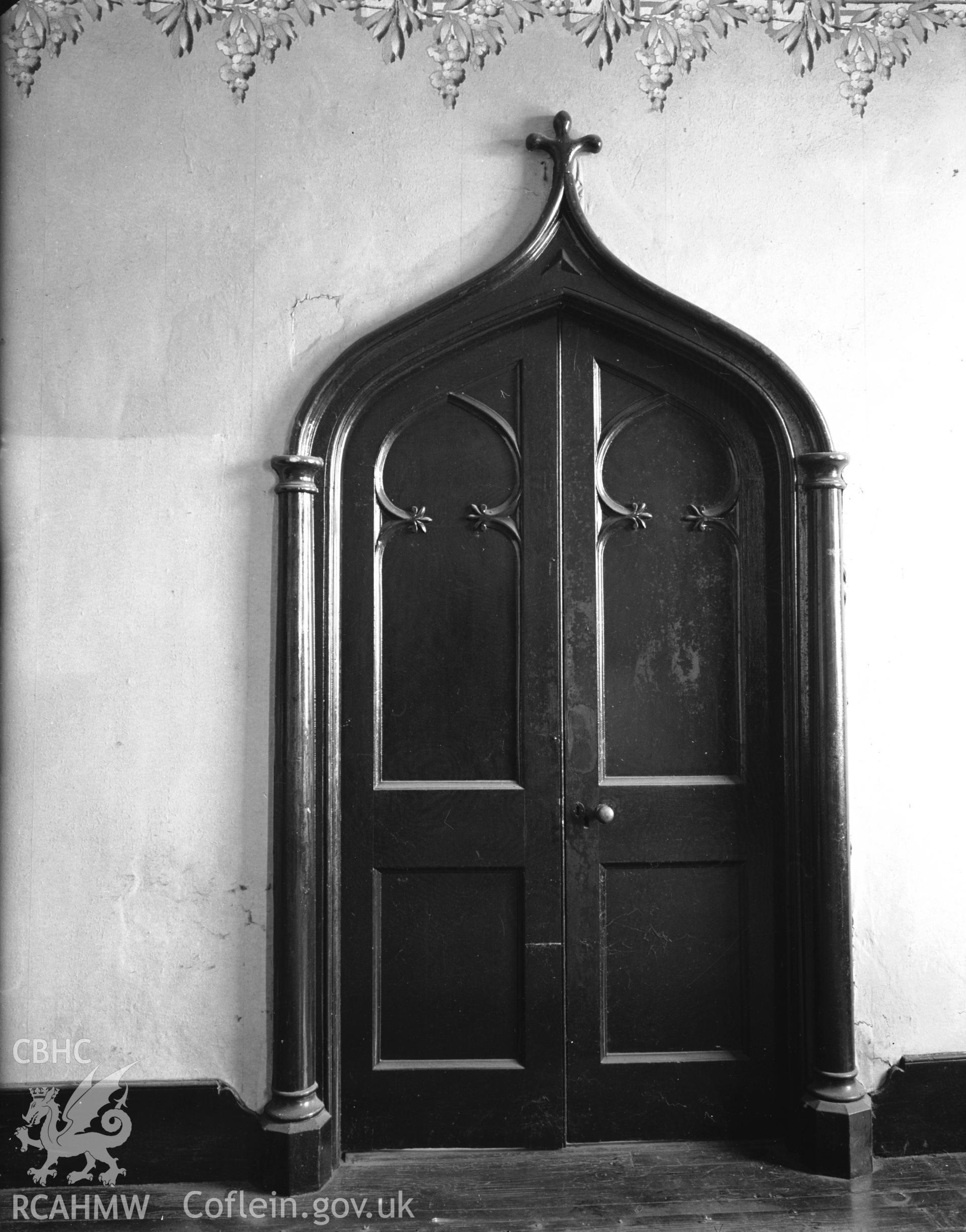 Interior view showing Gothic door on the second floor of Rhyd y Gors House.