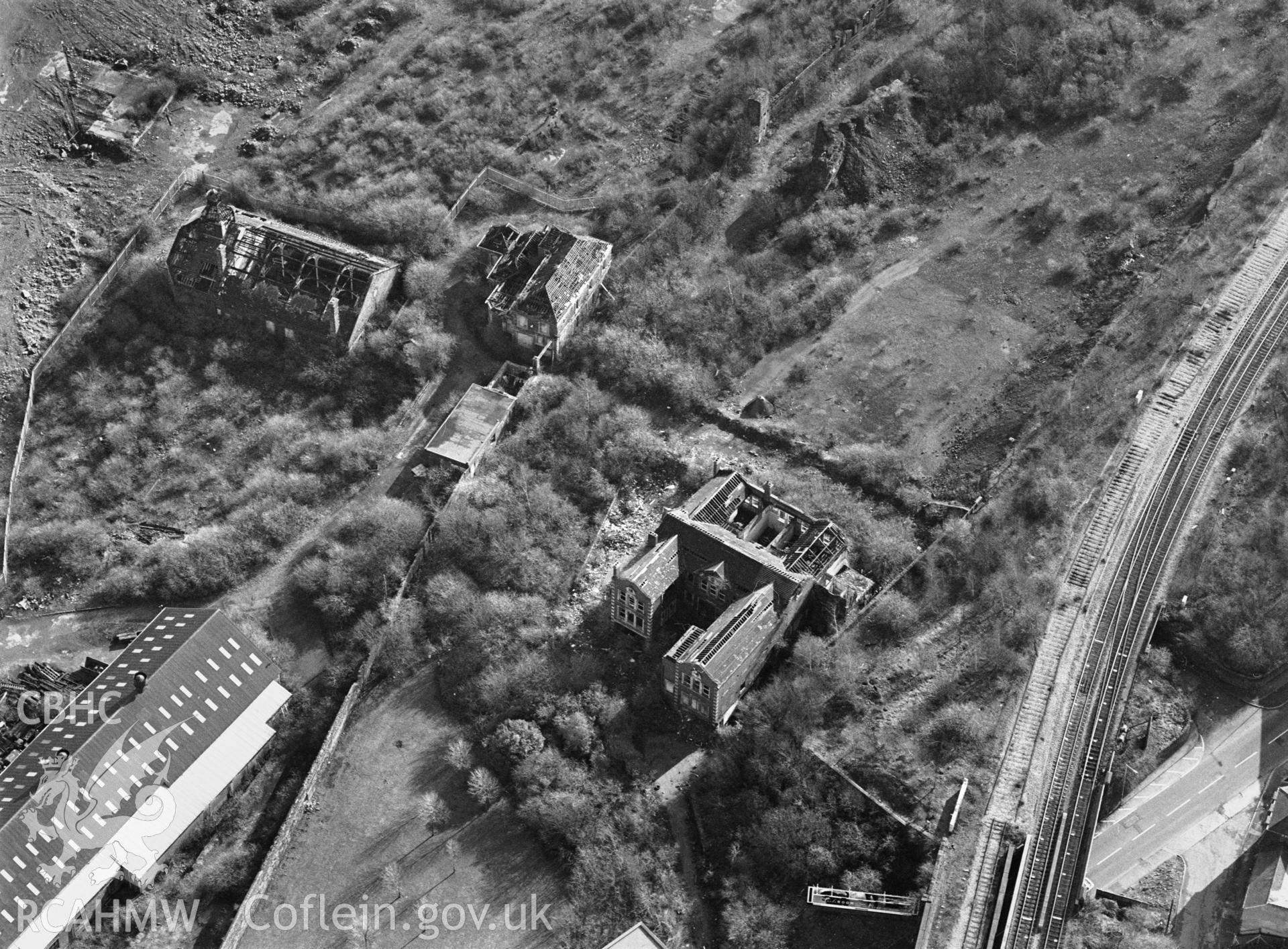 RCAHMW Black and white oblique aerial photograph of Morfa Copperworks Laboratory, Swansea, Landore, taken by C.R.Musson on the 15/02/1997