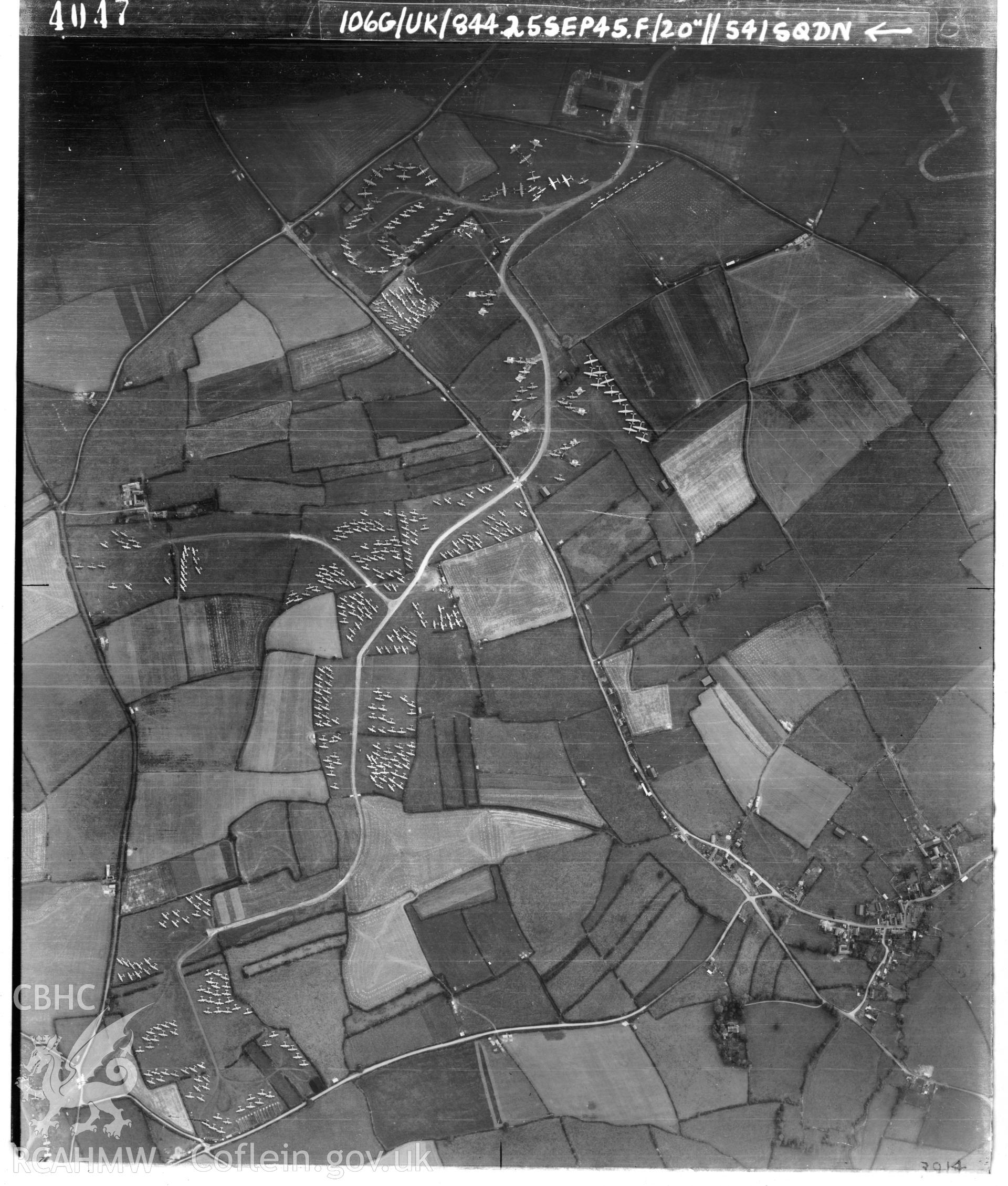 Black and white vertical aerial photograph taken by the RAF on 25/09/1945 centred on SS98707024 at a scale of 1:10000. The photograph includes part of Llan-maes community in The Vale of Glamorgan.