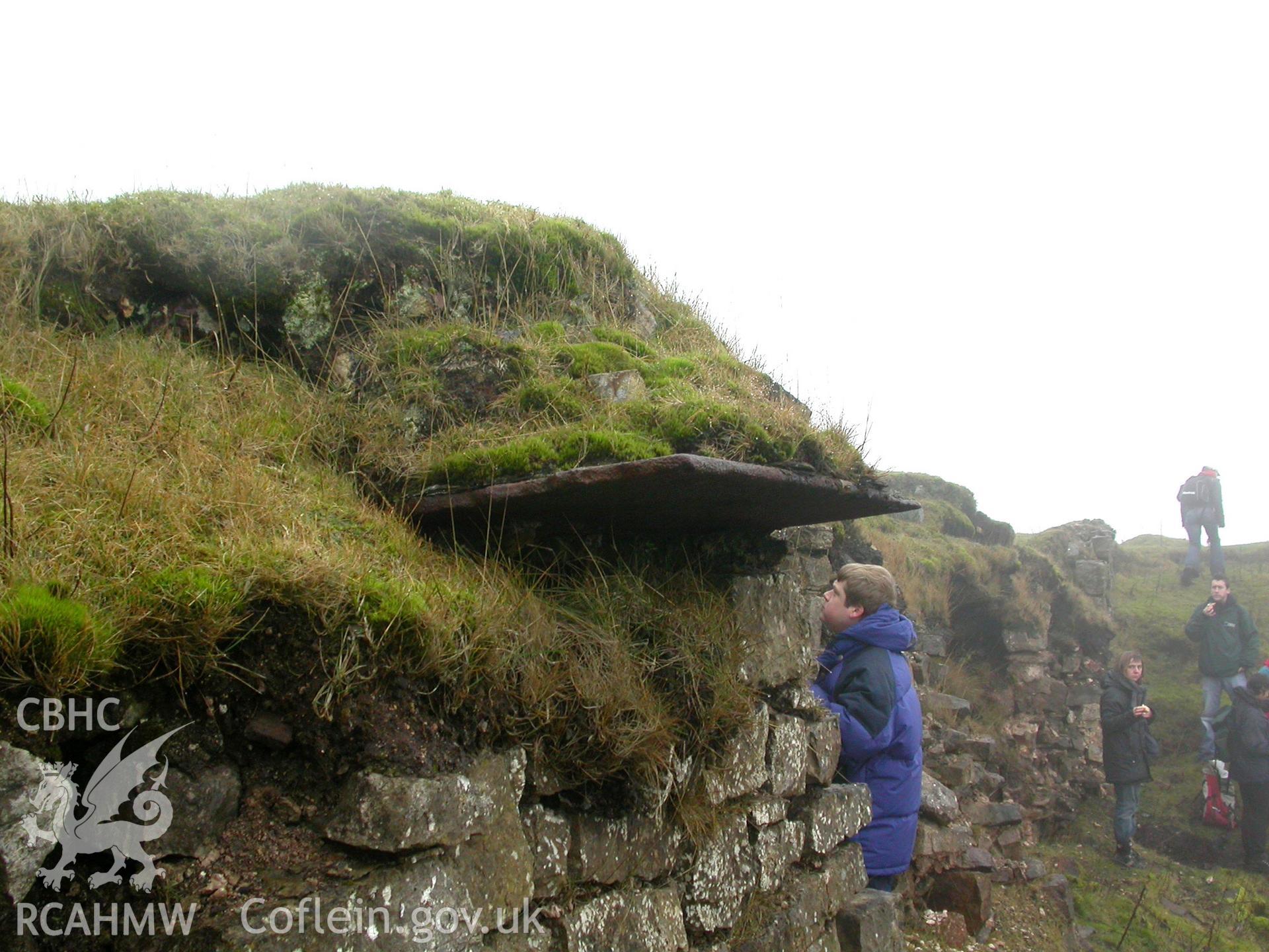 Exterior north-west wall of thee tunnel with cast-iron slab on top looking south-west.