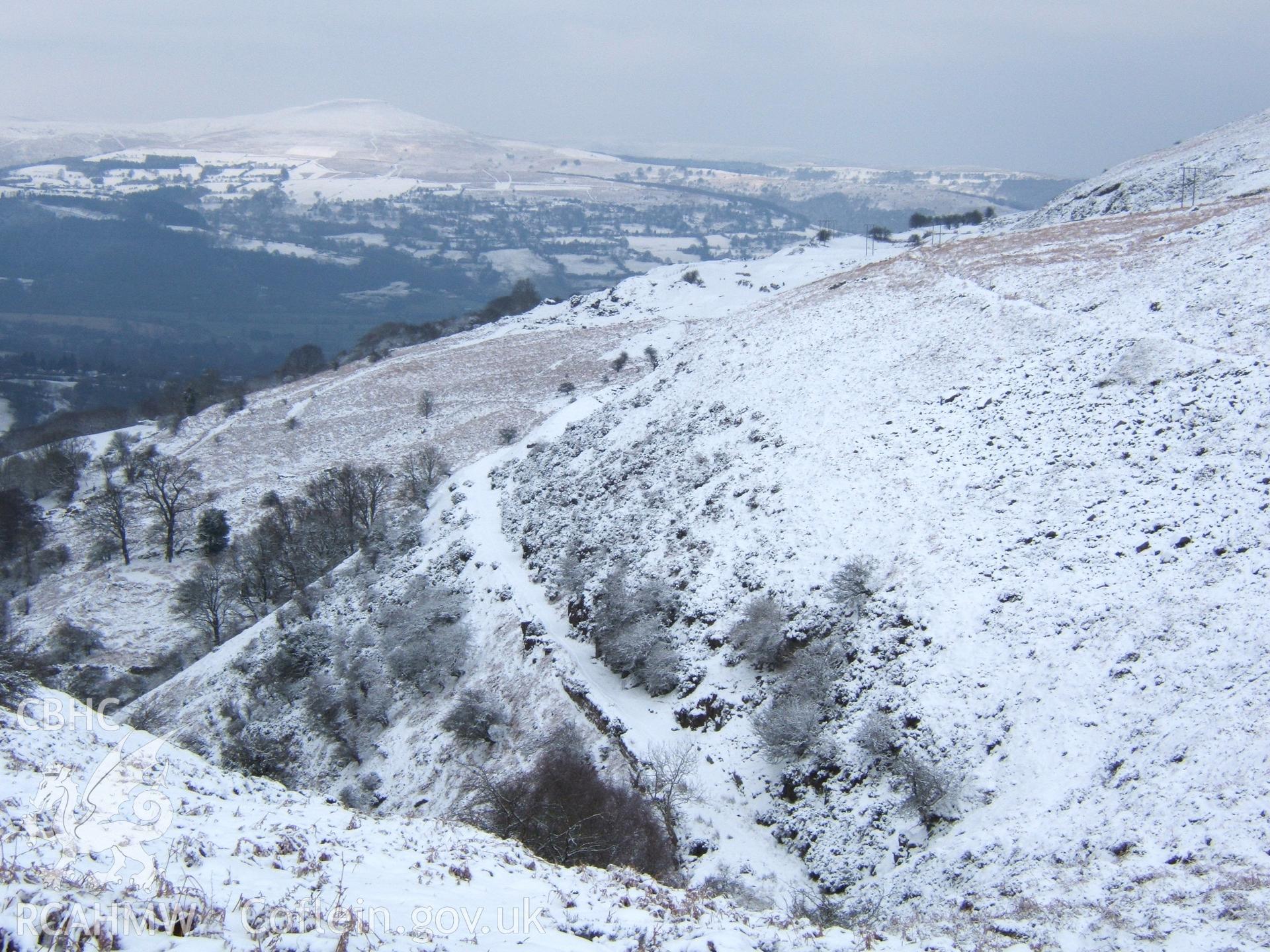 Tramroad from Cwm Llanwenarth bend & Blacksmith?s shop N to Garnddyrys Forge in the snow.