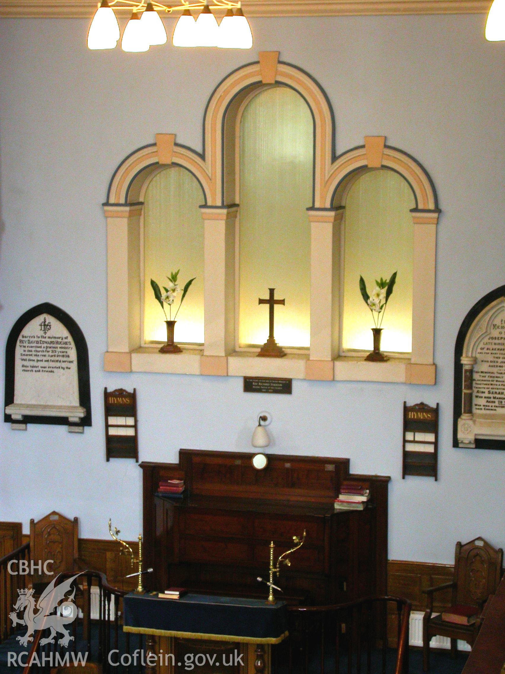 North-east arched Venetian Window, blocked by late Sunday school, behind pulpit.