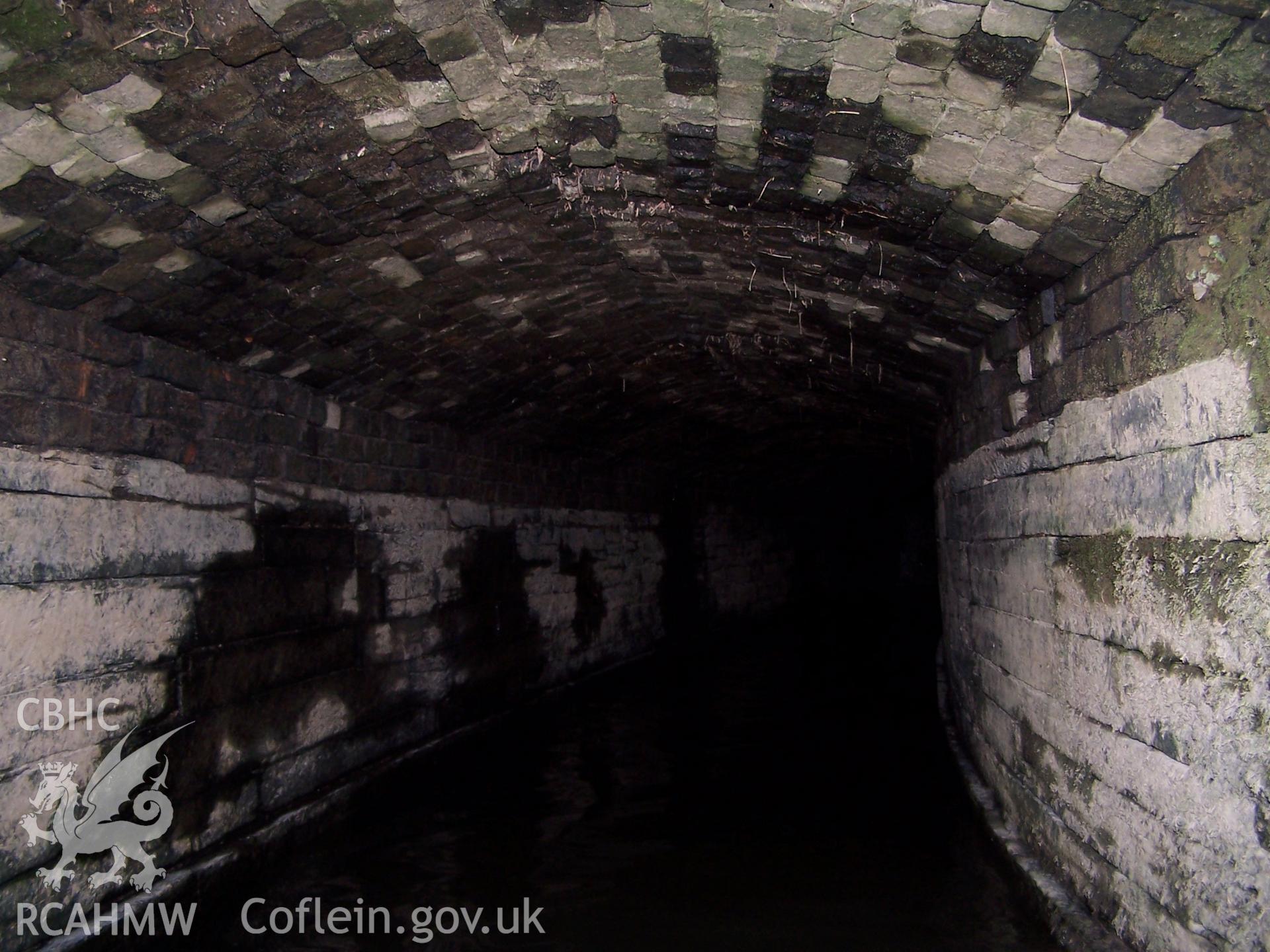 Looking east from the outtake portal along one of the curved culvert chambers.