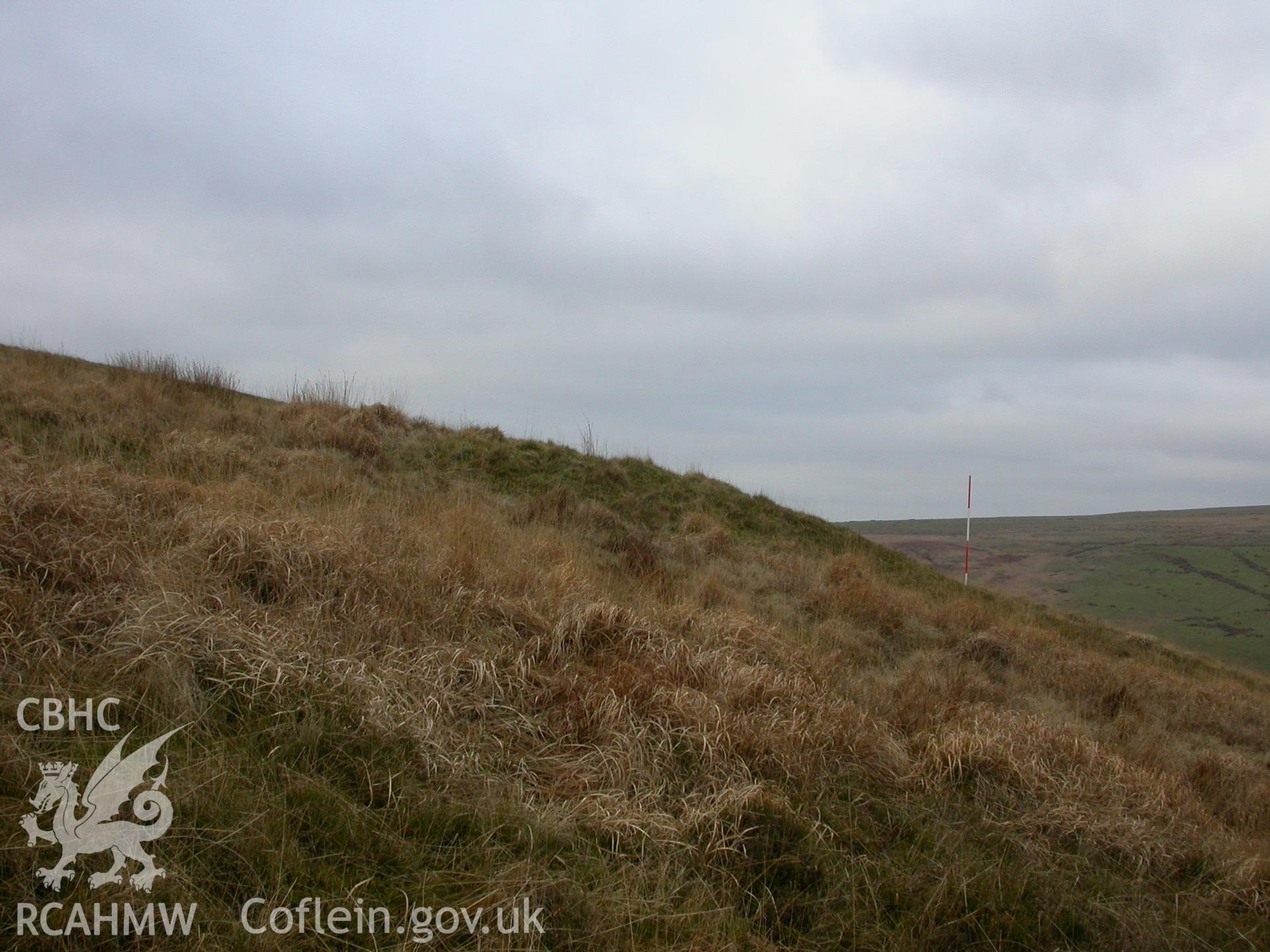 Mound on hill crest, view from north-east; scale 0.5m sections